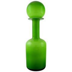 Holmegaard Large Bottle, Otto Brauer. Spherical Stopper, Bottle in Light Green.