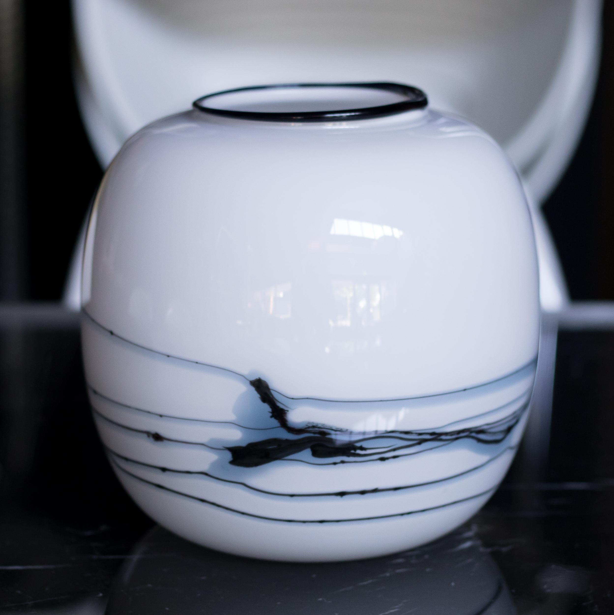 Round vase designed by Michael Bang for Holmegaard, Copenhagen. 
From the Atlantis series made in 1981. 
White, black and blue glass. Original Holmegaard sticker.
No chips or scratches.

Michael Bang is a renowned Danish glass artist known for his