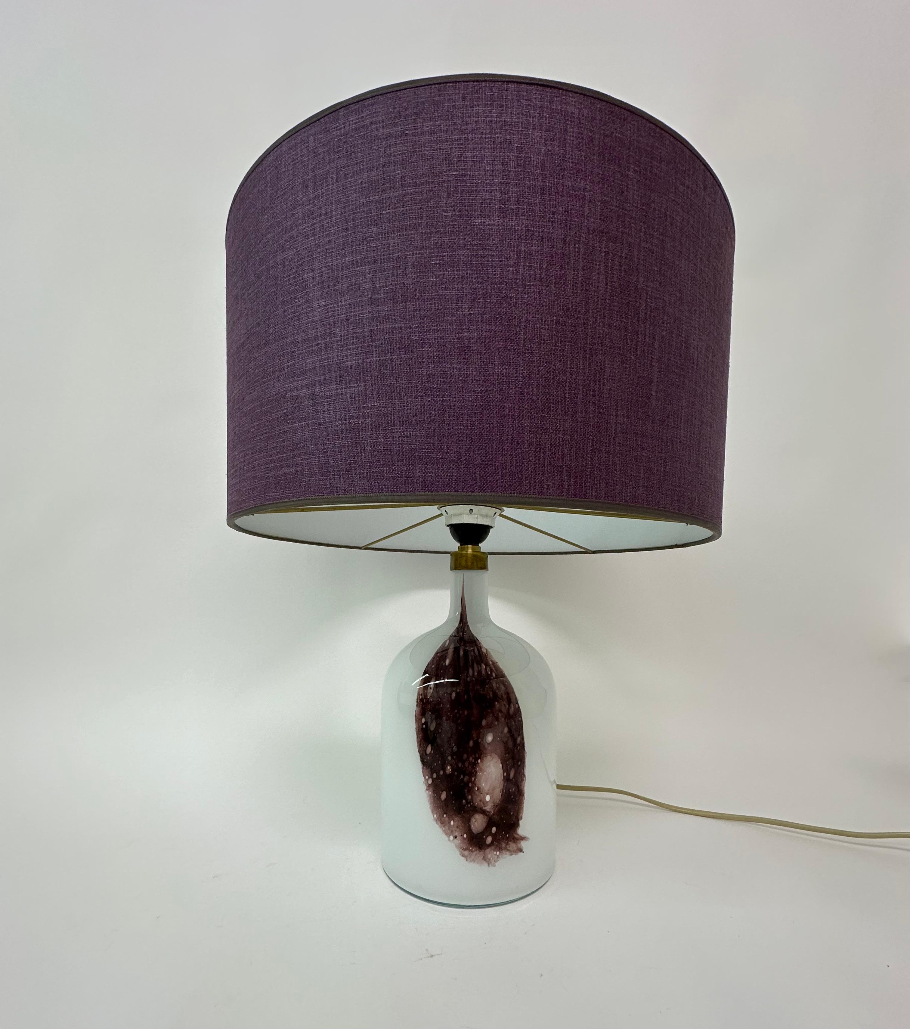 Holmegaard Symmetrisk glass table lamp by Michael Bang , 1970’s Denmark

Dimensions: 48,5cm H, 40cm Diameter
Condition: Good
Material: Glass , fabric
Color: Purple, White