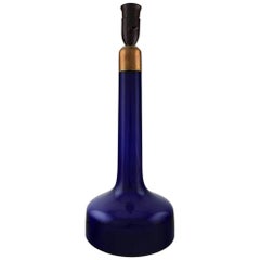 Holmegaard Table Lamp in Dark Blue Art Glass with Brass Mounting