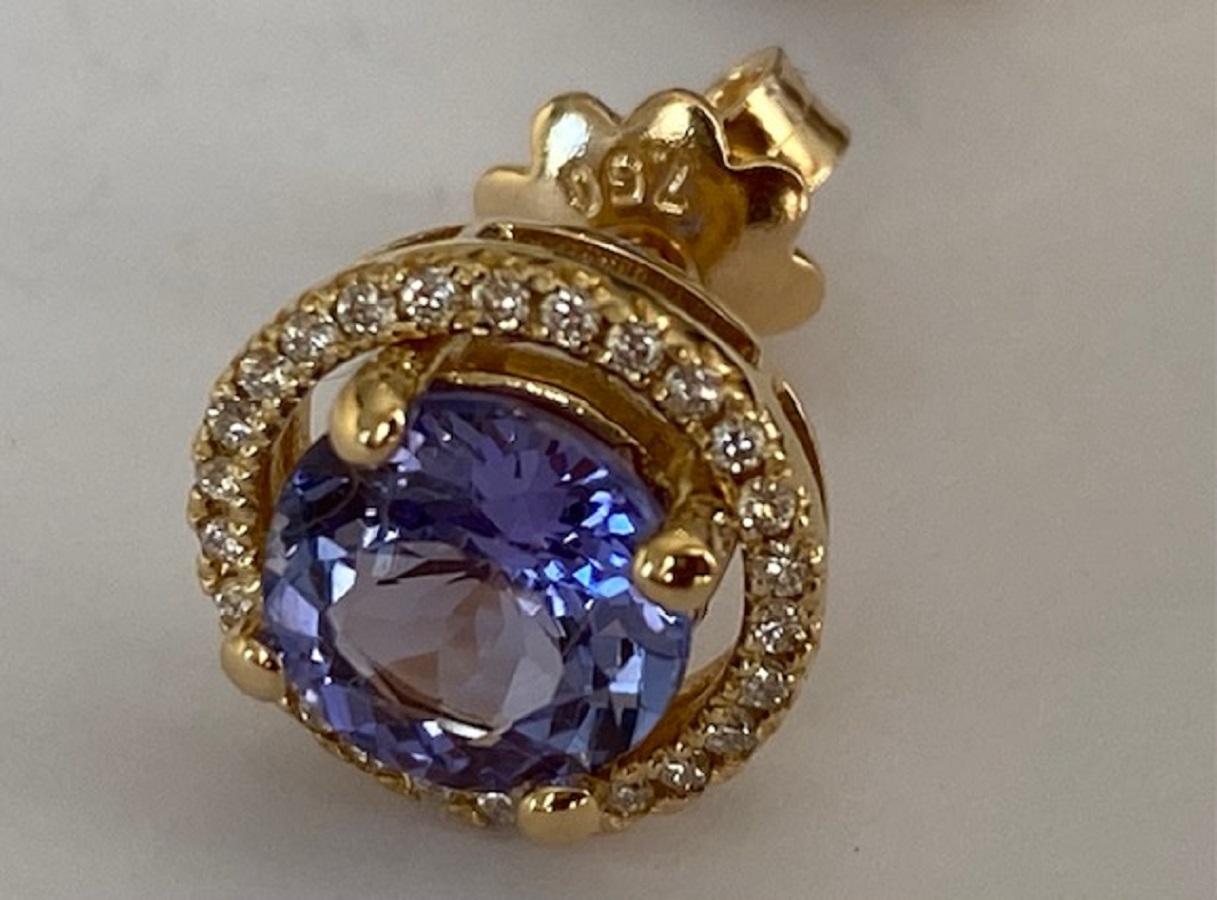 HALO ear studs 18 KT in yellow gold, with two pieces of tanzanite and diamonds For Sale 9