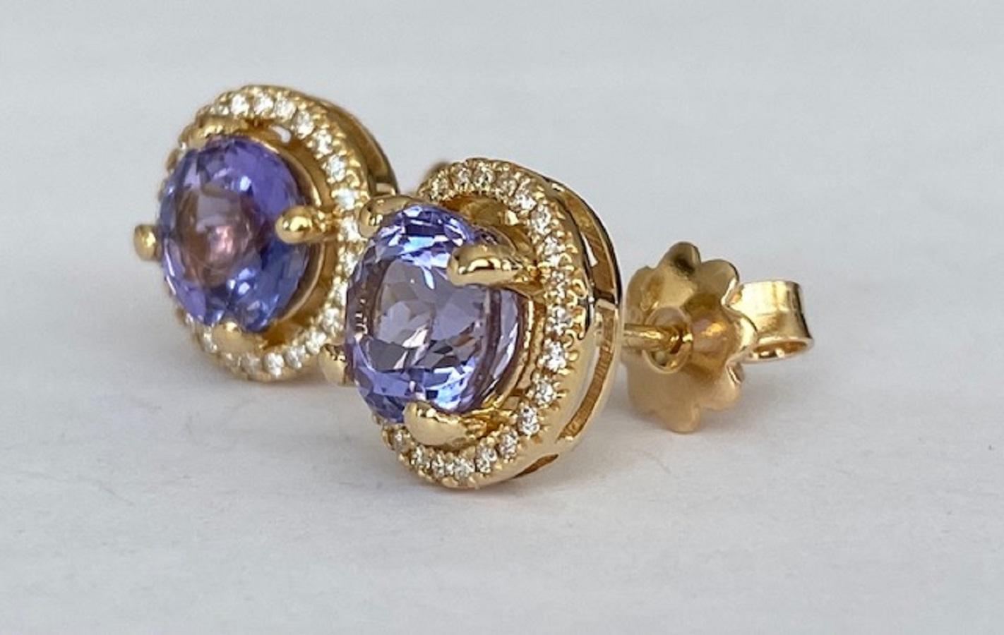 HALO ear studs 18 KT in yellow gold, with two pieces of tanzanite and diamonds For Sale 2