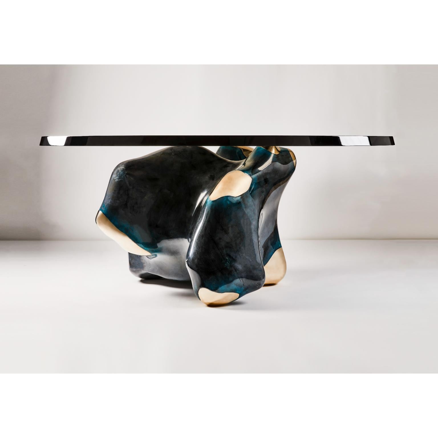 Holocene Dining Table by Three One Four Studio
Unique Piece.
Dimensions: D 170 x W 170 x H 75 cm.
Materials: Recycled modelboard, cast bronze, mixed media, lacquer, and resin.

THREE ONE FOUR studio was born from the symbiotic relationship between