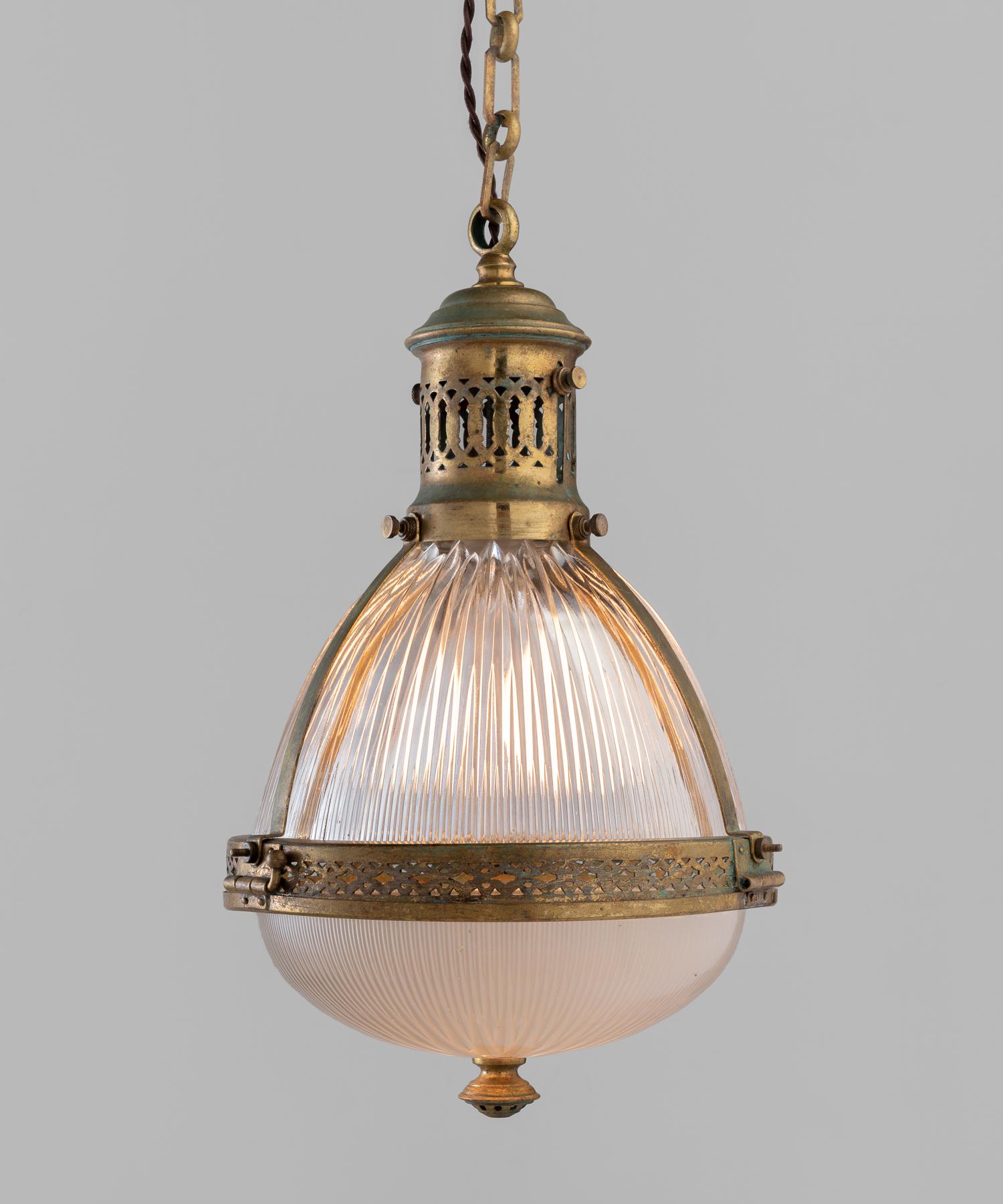 Holophane brass pendant, England, circa 1930

Two-part prismatic Holophane shade with brass hardware. Height includes chain.