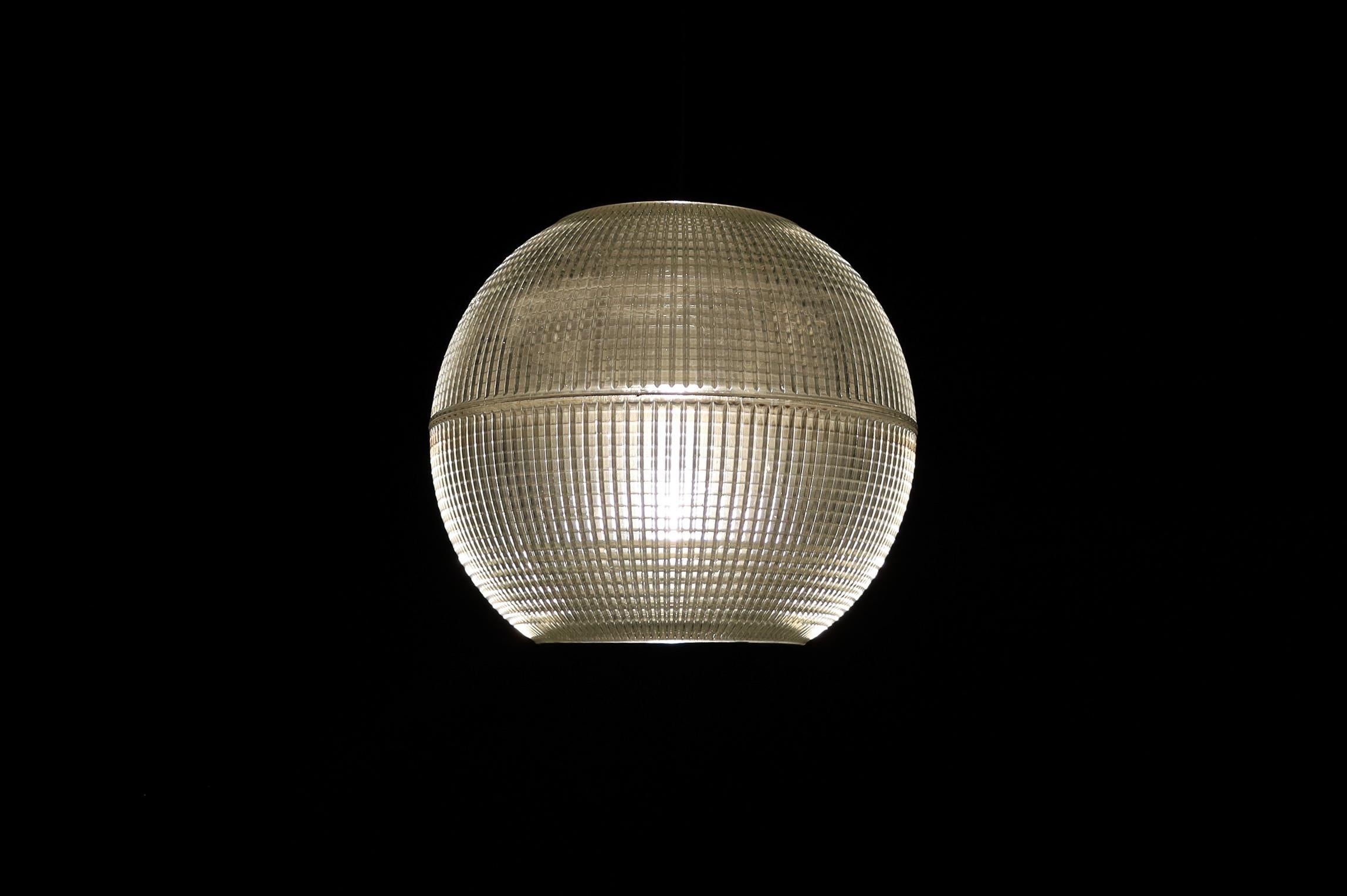 Holophane Pendant Light – Original Paris Streetlamp, France, 1960

This exceptional Holophane pendant light is a rare and iconic example of mid-century industrial design. Originally manufactured in France around 1960, this fixture once illuminated