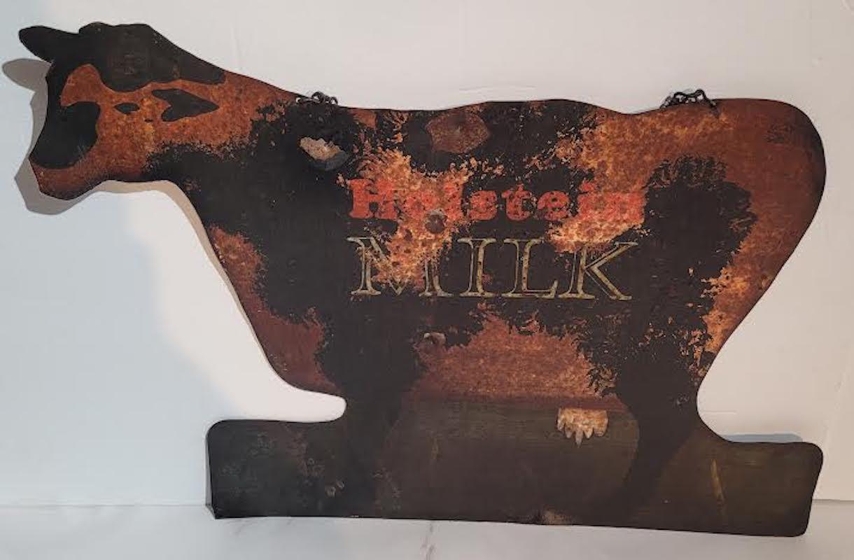 This folky original painted hand made Holsteins Milk metal farm trade sign has the original chain for hanging.It has spots that has paint loss and minor wear.The sign is in as found condition consistent with age and use. Probably from a dairy farm.