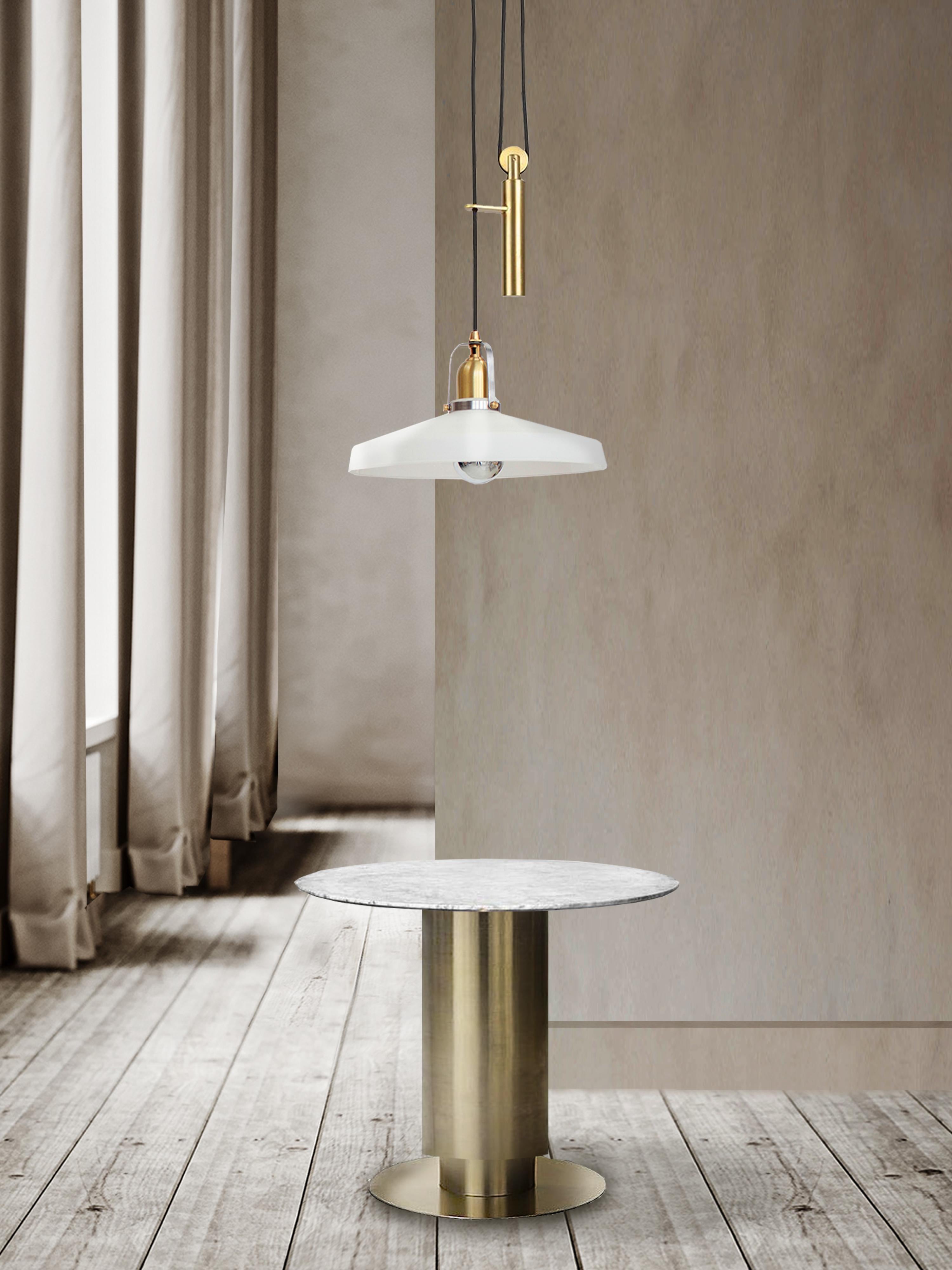 Striking a beautiful balance between functionality and aesthetic, the Holt pendant, hand made in Prague and London, uses subtle detailing and a well considered material pallet of warm brushed metals with whitened crystal glass to create an aesthetic