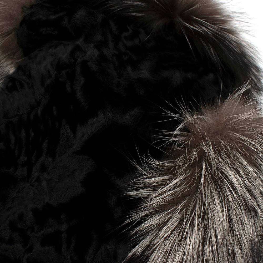 Holt Renfrew Astrakhan & Racoon Fur Jacket

- Mixture of warm brown racoon & black astrakhan fur
- Very soft to touch
- Perfect for the winter months - very warm
- Lambskin belted waist
- Silk black lining
- invisible button fastening on the lower