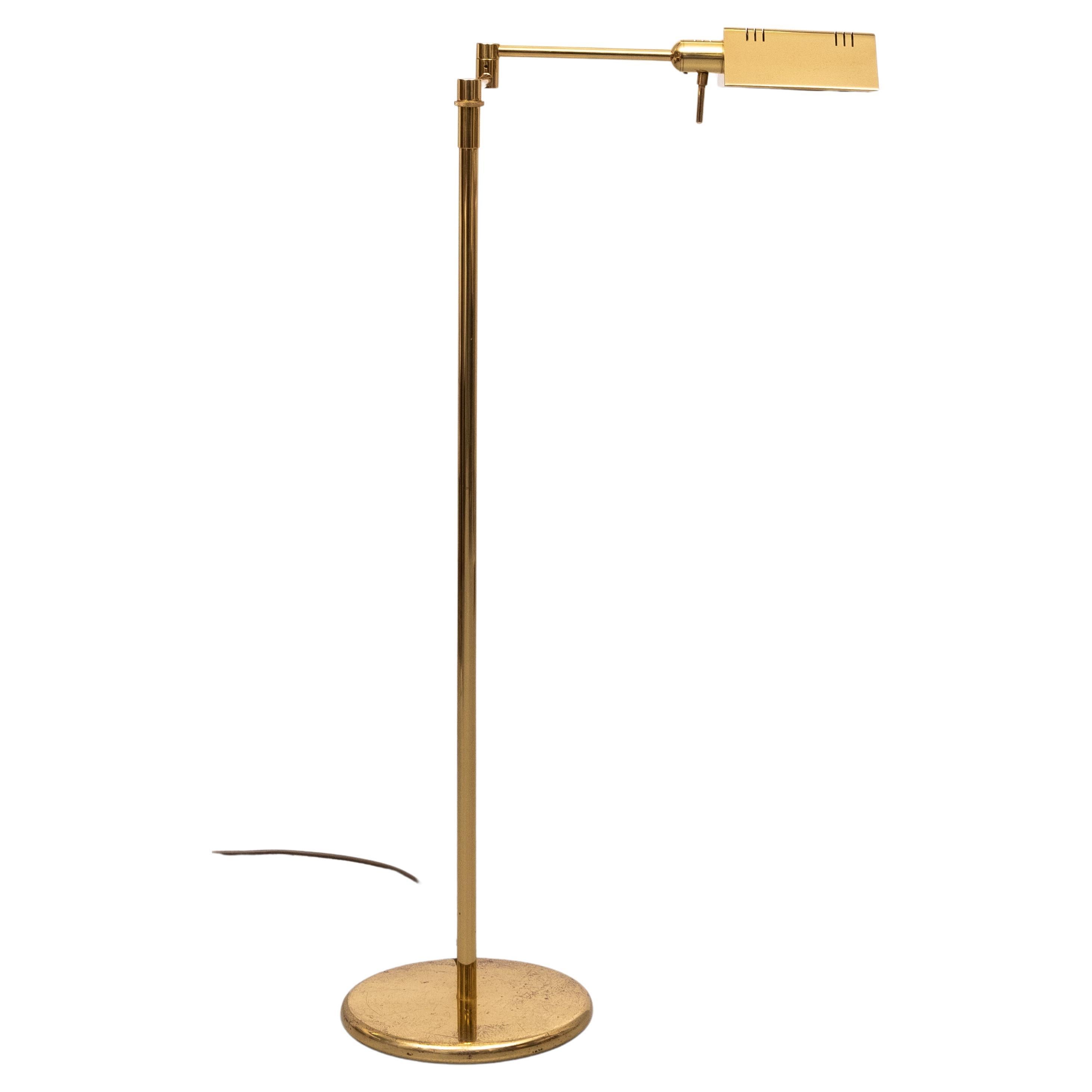 Beautiful Halogen Brass floor lamp .  Adjustable in height . 
Comes with a new and good working Dimmer ''see Video'' Ideal reading light .Good condition ,only the base shows users marks . Top quality lamp.