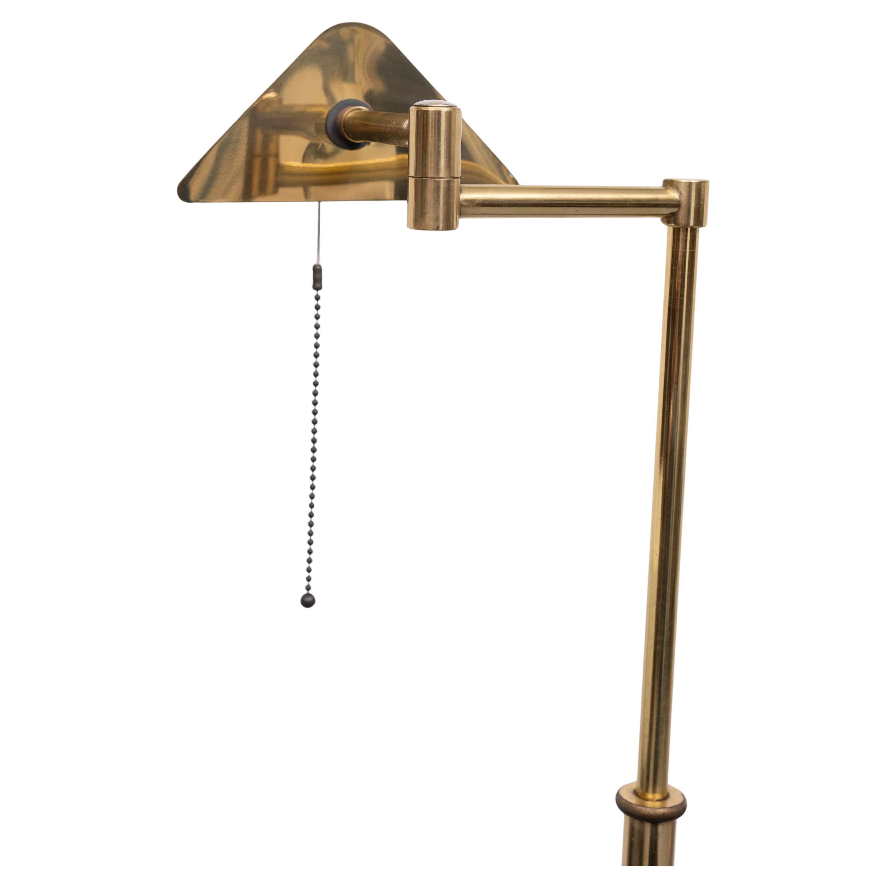 Beautiful Brass Library swing arm  floor lamp ,adjustable in height . 
Pull down switch . Normal large E27 bulb needed . Timeless design.
Ideal reading lamp . good condition . 