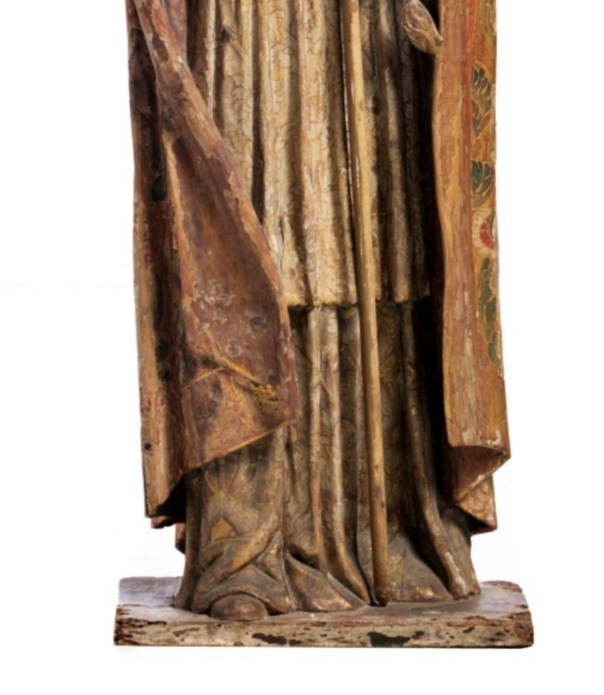 Holy Bishop sculpture 18th century

Portuguese sculpture, from the 18th century. 
in upholstered, polychrome and gilded wood.
Fingers flaws. faults and defects,
Measure: Height: (total) 122 cm
Good condition for the age.