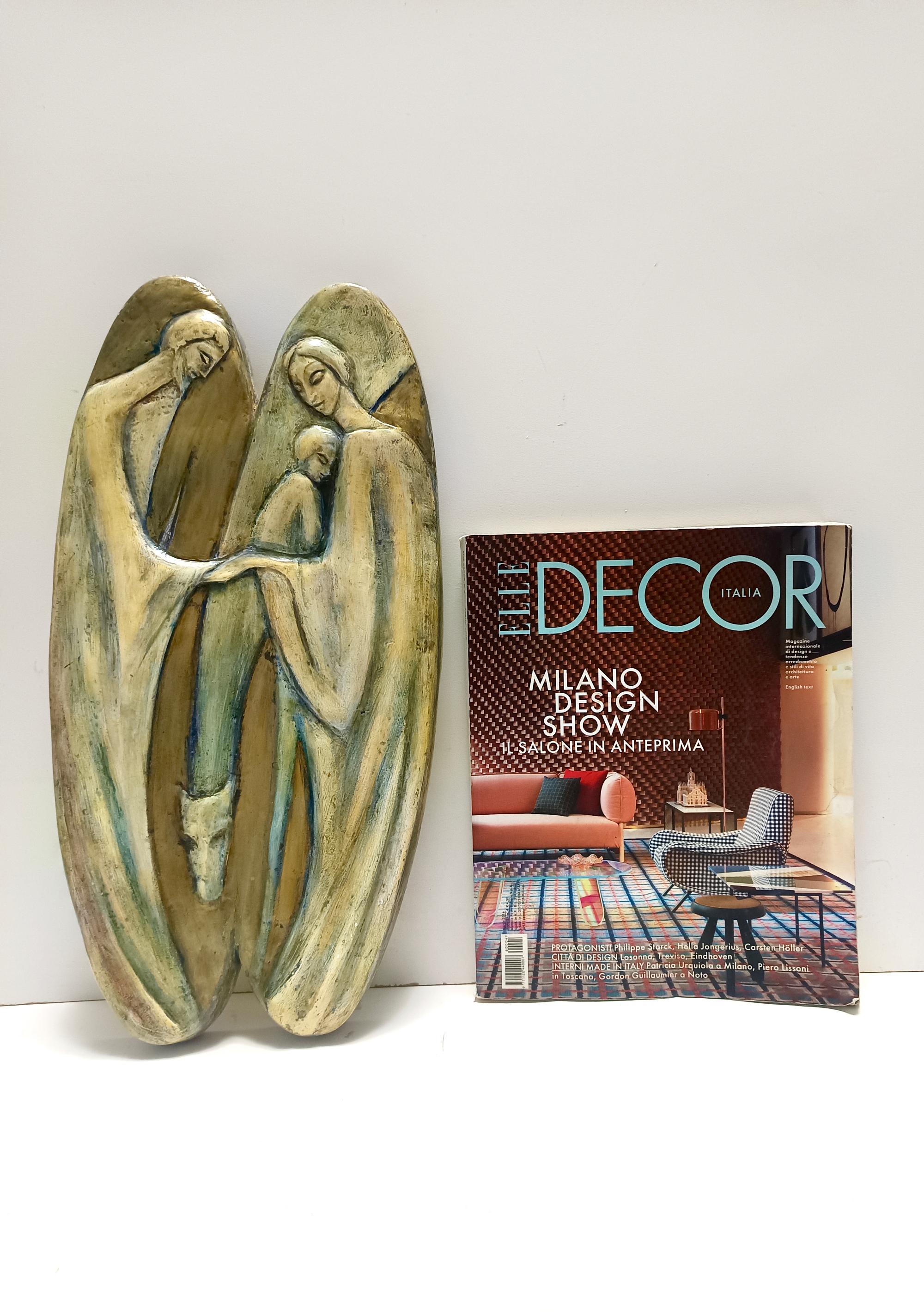 Made in Italy, 1960s. 
This beautiful beech piece is carved and painted by hand.
It is signed.
The panel is vintage, therefore it might show slight traces of use, but it can be considered as in perfect original condition with its original