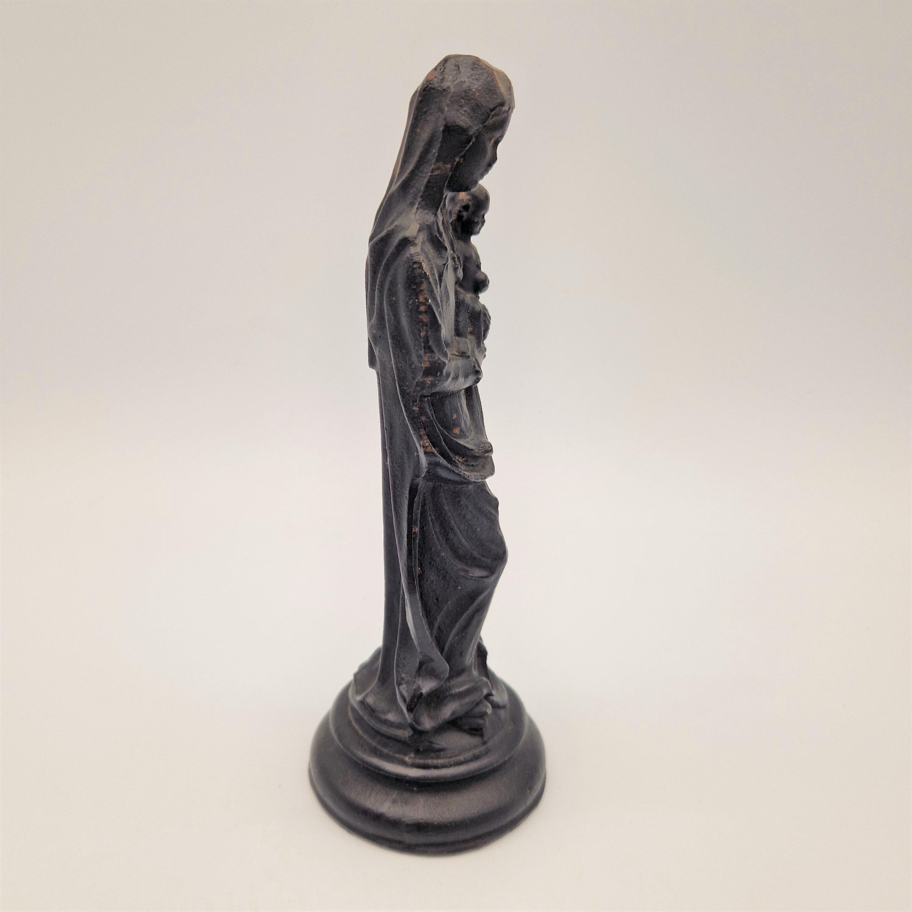 Art Nouveau Holy Figure Of Mary With Child Made Of Cast Iron. 1900 1920 For Sale