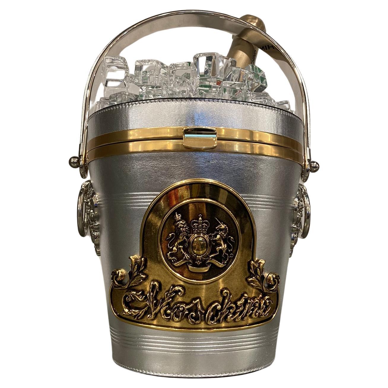 

THE HOLY GRAIL OF ALL MOSCHINO BAGS!



MOSCHINO COUTURE

CHAMPAGNE ICE BUCKET LEATHER LOGO PLAQUE BAG

AW22 Collection by Jeremy Scott



MSRP $5,175 + tax!



Rare and Highly Sought After Collector's Item




Limited Availability and Hard to