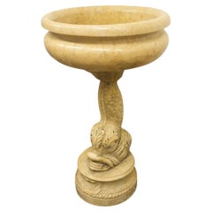 Cheminée Sainte eau en marbre jaune antique