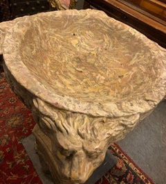 Holy water stoup in polychrome "breccia" marble, from Tuscany, late 1600s
