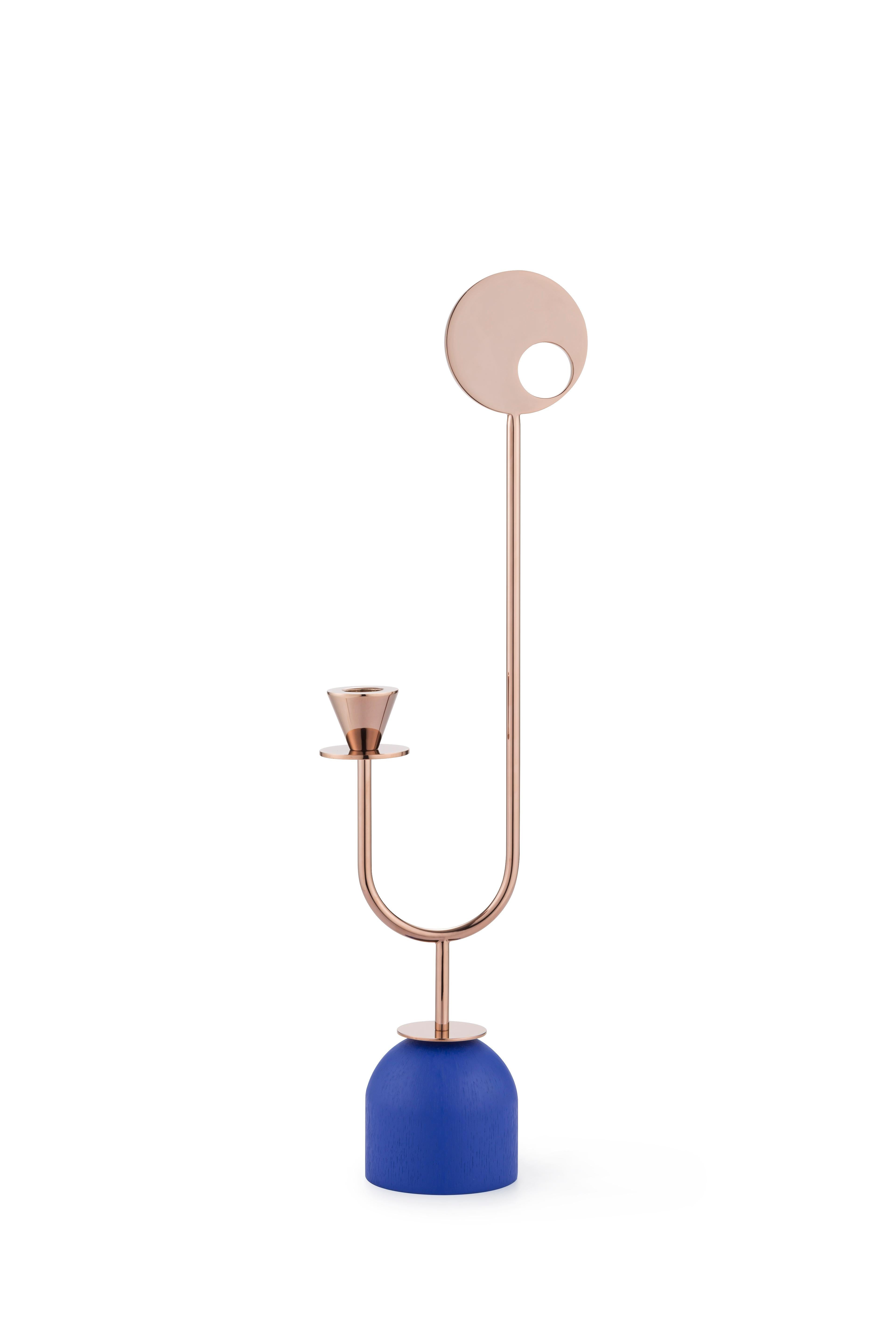 Homage to Memphis Movement - candleholder
Measures: D 8.5 x W 15 x H 50 cm
Plated metal coated with glossy pink copper finish
Base in ash veneer painted in matte dusty pink, yellow or blue

Paris-Memphis capsule collection draws its inspiration