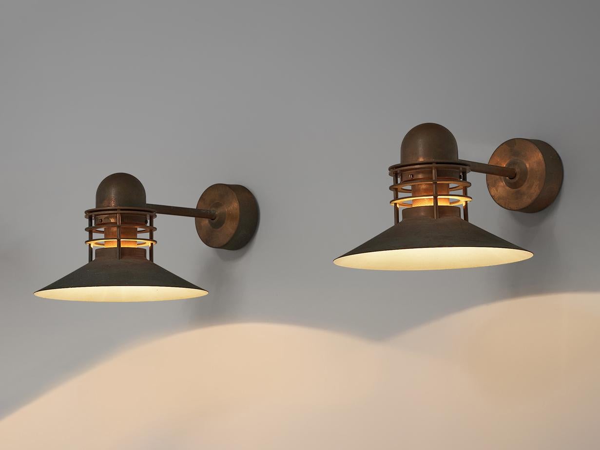 Alfred Homann & Ole V. Kjær for Louis Poulsen, wall lamps model ‘Nyhavn’, copper, Denmark, design 1976

The ‘Nyhavn’ wall lamp by Alfred Homann and Ole V. Kjær was designed in 1976. It won a price in a competition organized by Louis Poulsen. It