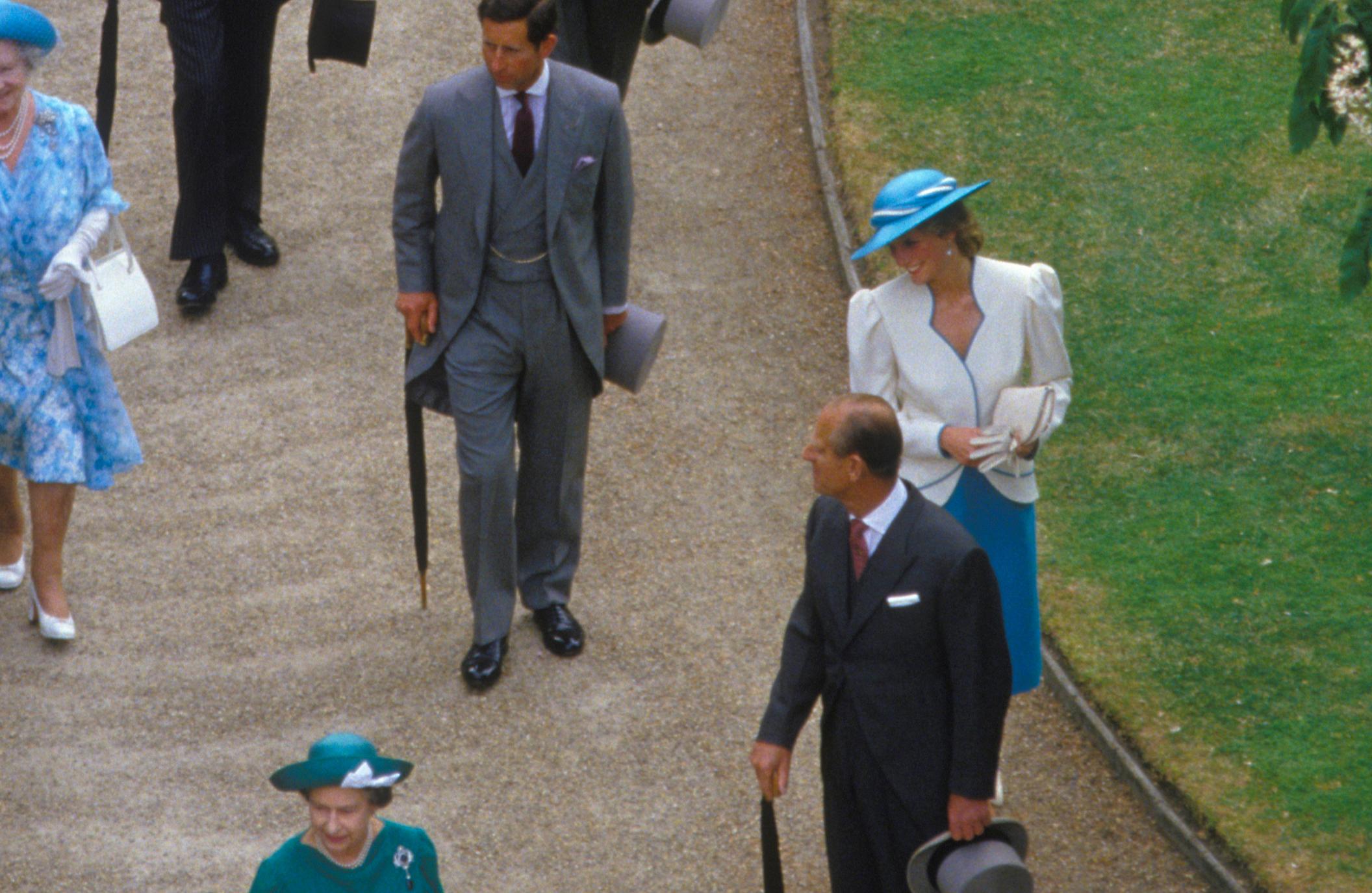 Royals Buckingham Palace Garden Party - oversized signed limited edition print - Photograph by Homer Sykes 