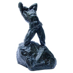 “Homme à genoux sur un rocher” by Alfredo Pina