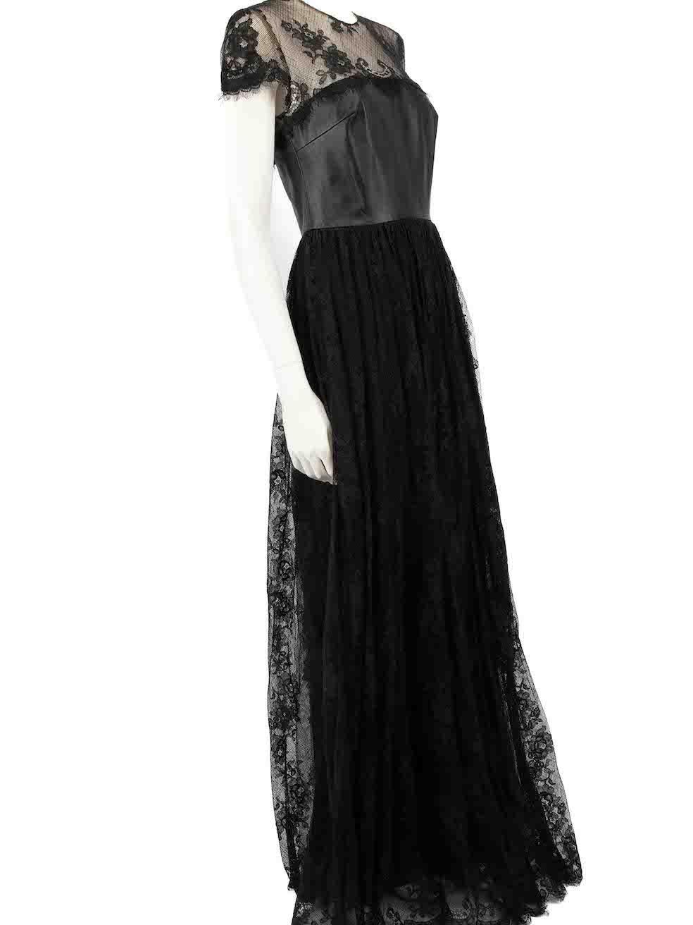 CONDITION is Very good. Minimal wear to dress is evident. Minimal wear to lining with discolouration on this used Honayda designer resale item.
 
 
 
 Details
 
 
 Black
 
 Lace
 
 Gown
 
 Short sleeves
 
 Leather panel
 
 Round neck
 
 Maxi
 
 Back