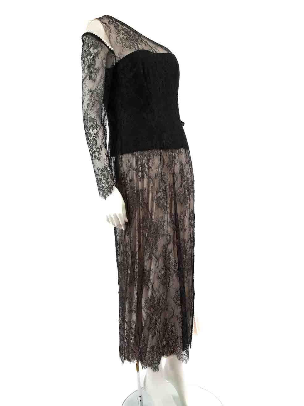 CONDITION is Very good. Minimal wear to dress is evident. Minimal wear to one ribbon where it is frayed at the stitching on this used Honayda designer resale item.
 
 
 
 Details
 
 
 Black
 
 Lace
 
 Long top
 
 Sheer
 
 One shoulder
 
 Long