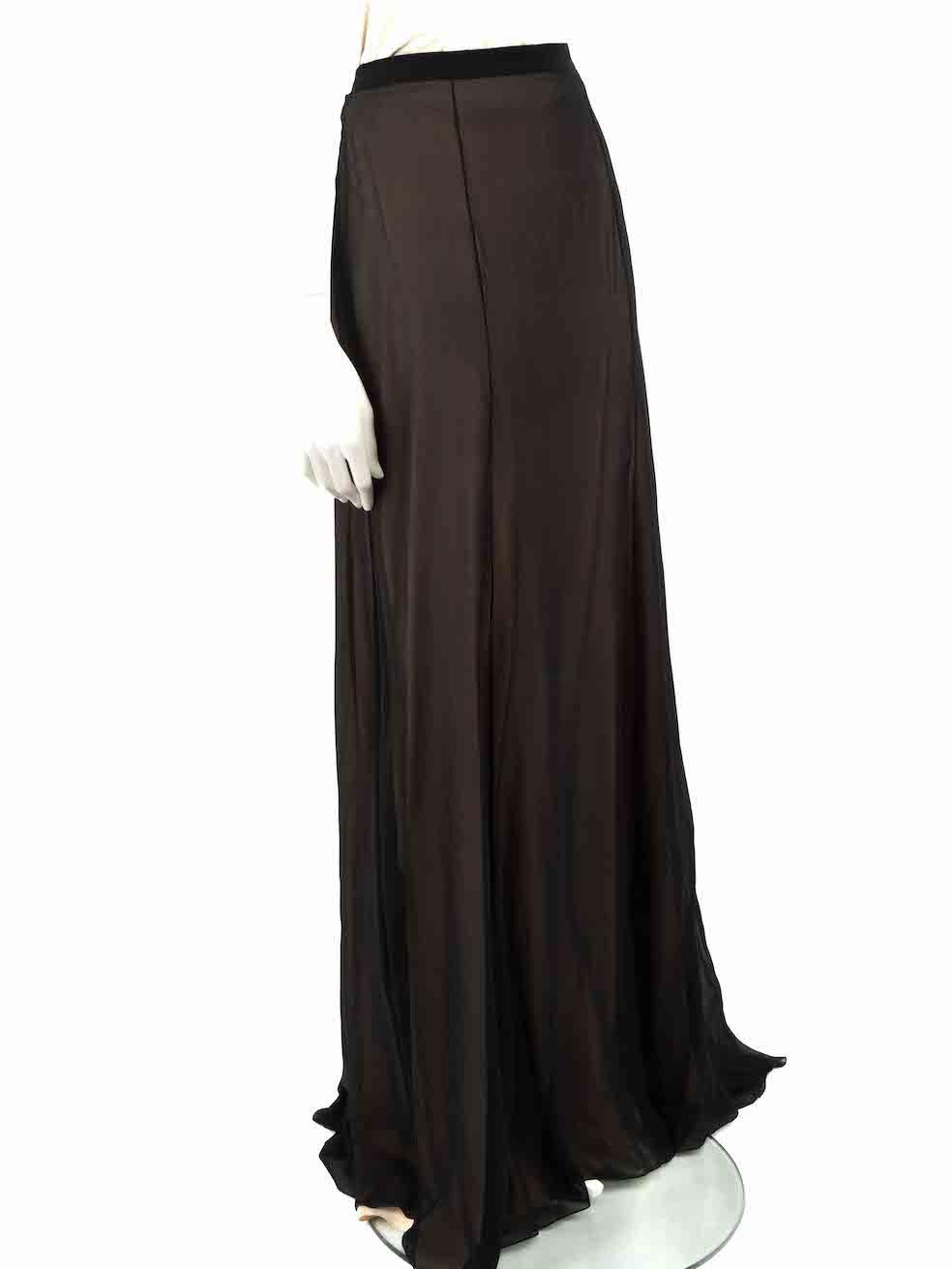 CONDITION is Very good. Hardly any visible wear to dress is evident on this used Honayda designer resale item.
 
 
 
 Details
 
 
 Black
 
 Synthetic
 
 Skirt
 
 Maxi
 
 Sheer black overlay
 
 Beige lining
 
 Back zip and hook fastening
 
 
 
 
 
