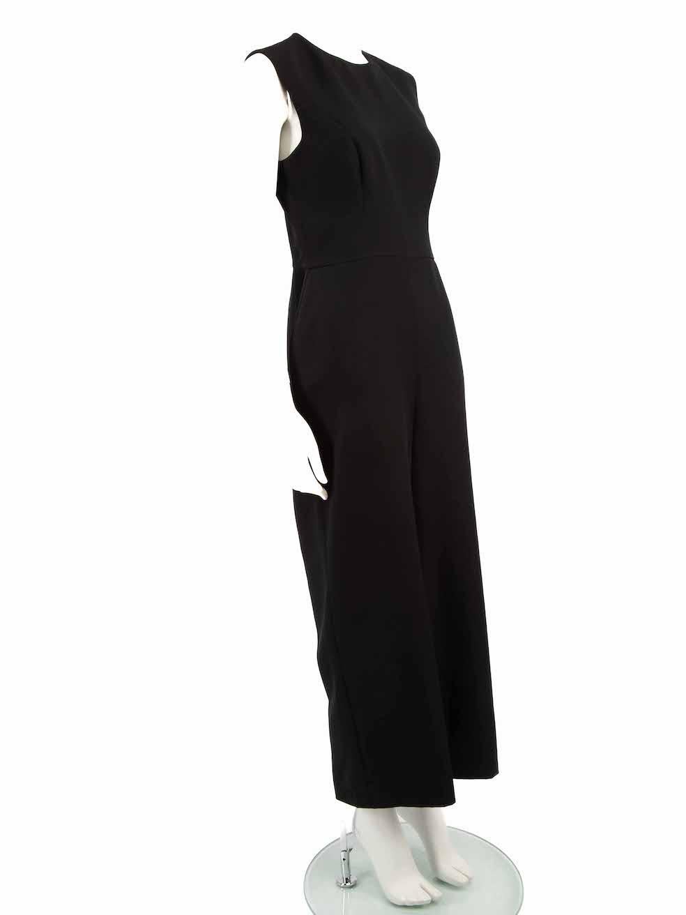 CONDITION is Very good. Hardly any visible wear to jumpsuit is evident on this used Honayda designer resale item.
 
 
 
 Details
 
 
 Black
 
 Synthetic
 
 Jumpsuit
 
 Sleeveless
 
 Wide leg
 
 Round neck
 
 Back zip and hook fastening
 
 
 
 
 
