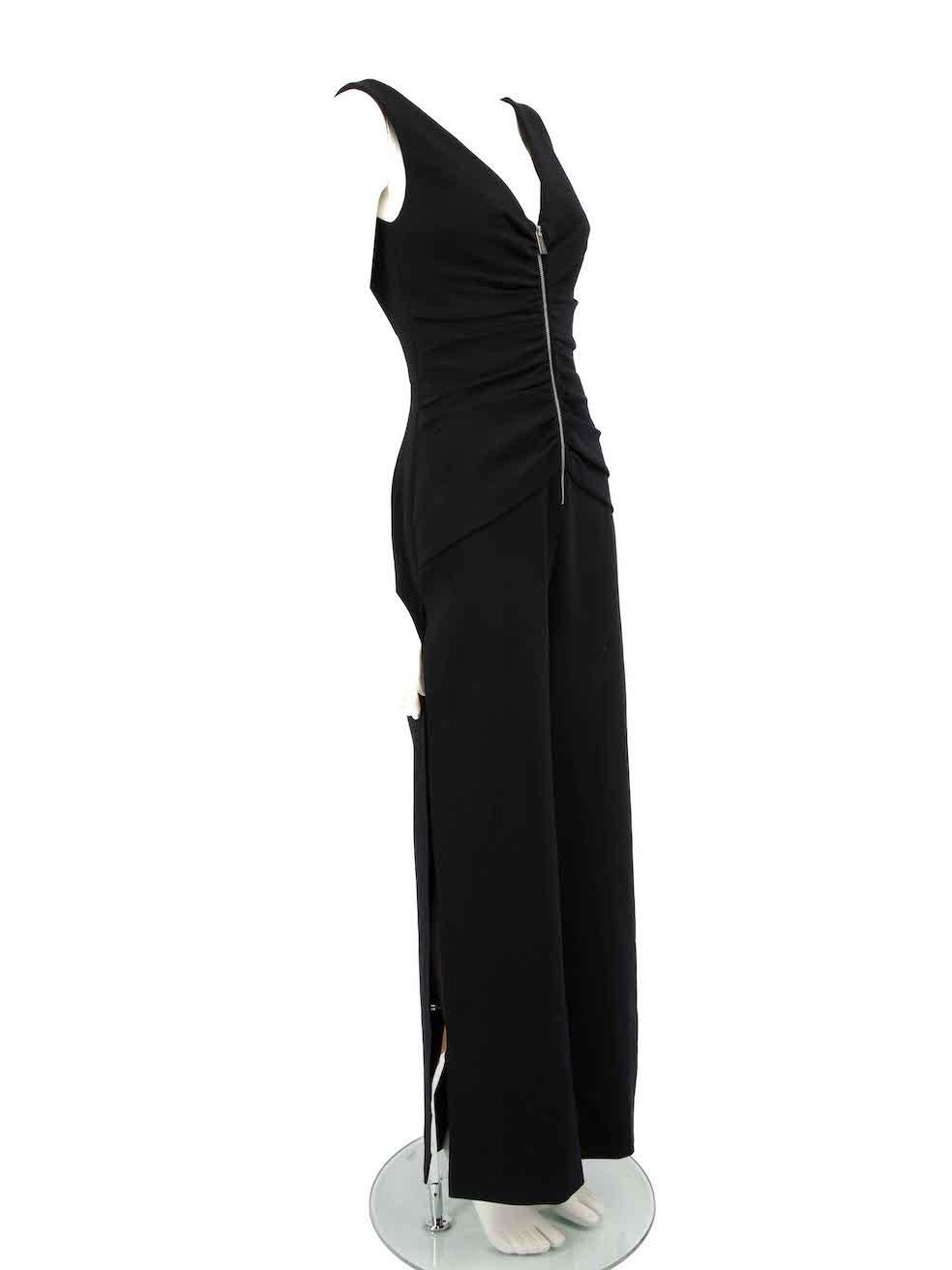 CONDITION is Very good. Minimal wear to jumpsuit is evident. Minimal wear to front zip pleats with scratches to fabric on this used Honayda designer resale item.
 
 
 
 Details
 
 
 Black
 
 Synthetic
 
 Jumpsuit
 
 Sleeveless
 
 V-neck
 
 Pleated