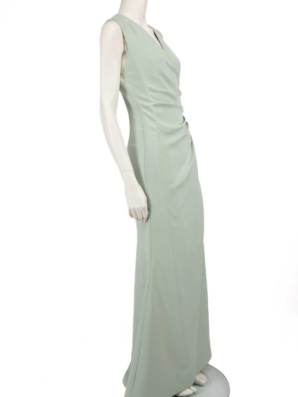CONDITION is Very good. Minimal wear to dress is evident. Some small plucks to the weave and a mark at the front hem on this used Honayda designer resale item.
 
 
 
 Details
 
 
 Mint green
 
 Synthetic
 
 Gown
 
 Sleeveless
 
 Maxi
 
 Plunge neck
