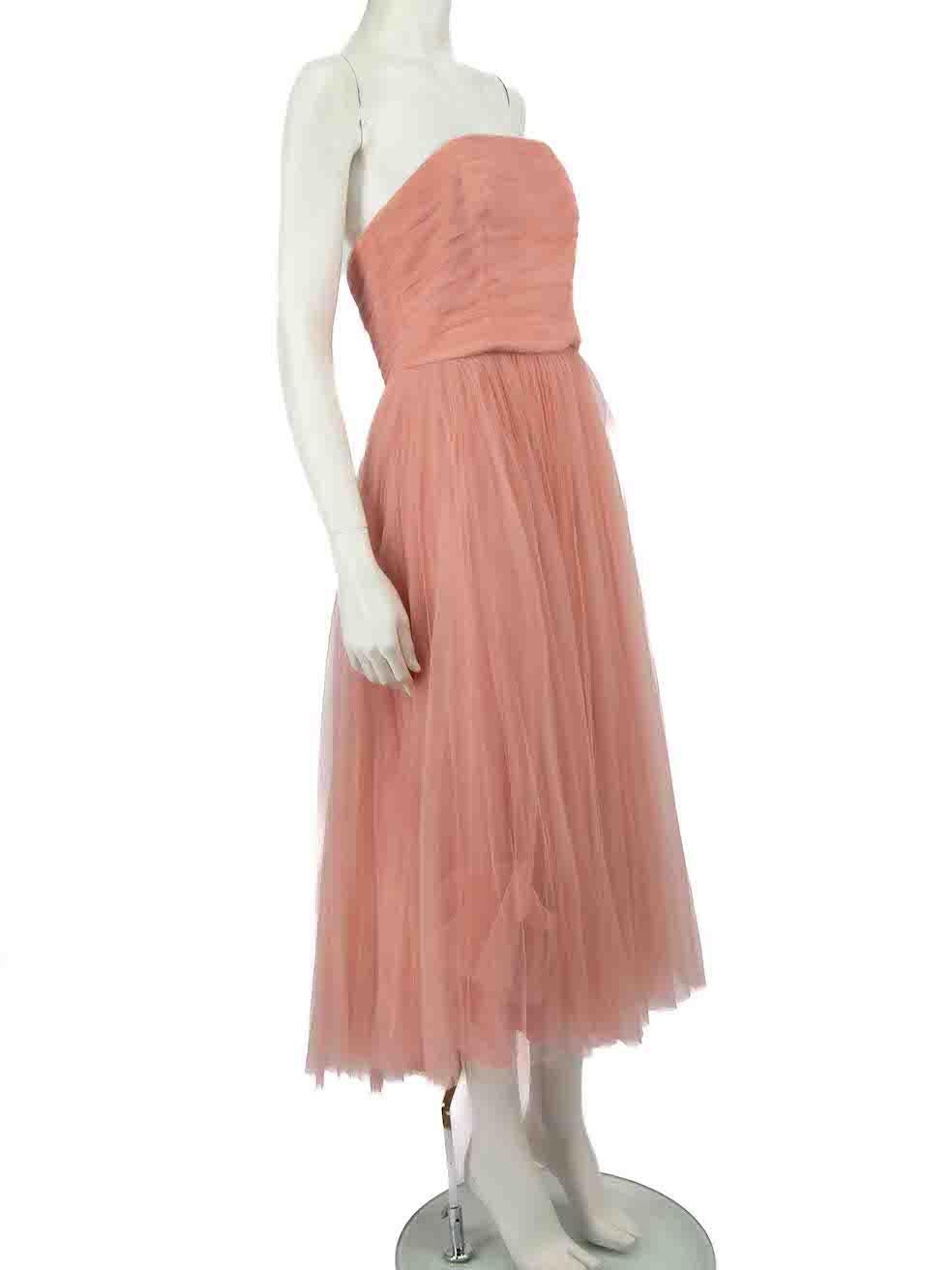 CONDITION is Very good. Hardly any visible wear to dress is evident on this used Honayda designer resale item.
 
 
 
 Details
 
 
 Pink
 
 Tulle
 
 Gown
 
 Strapless
 
 Midi
 
 Pleated skirt
 
 Back zip and hook fastening
 
 
 
 
 
 Made in Lebanon
