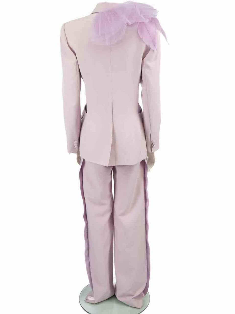 CONDITION is Good. General wear to blazer and trouser set is evident. Moderate signs of discolouration to the front and back hemline. Small marks on both side tapes, on the front top left of the trousers as well as the back hem of the trousers. Pull