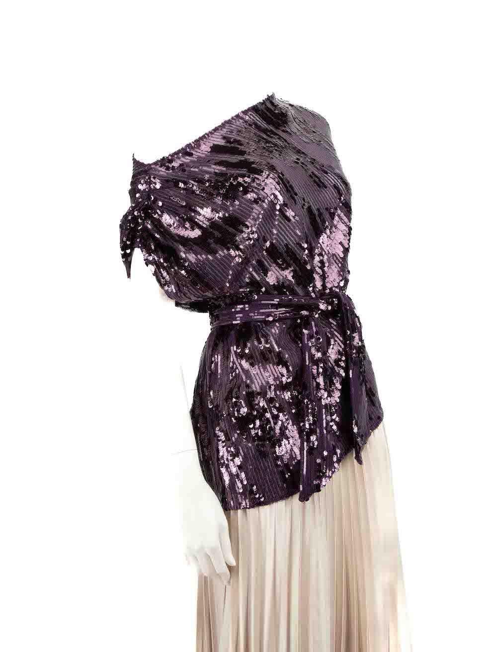CONDITION is Very good. Minimal wear to top is evident. Minimal wear to neckline with missing sequins and loose threads on this used Honayda designer resale item.
 
 
 
 Details
 
 
 Purple
 
 Synthetic
 
 Top
 
 Sequinned
 
 Asymmetric sleeves
 
