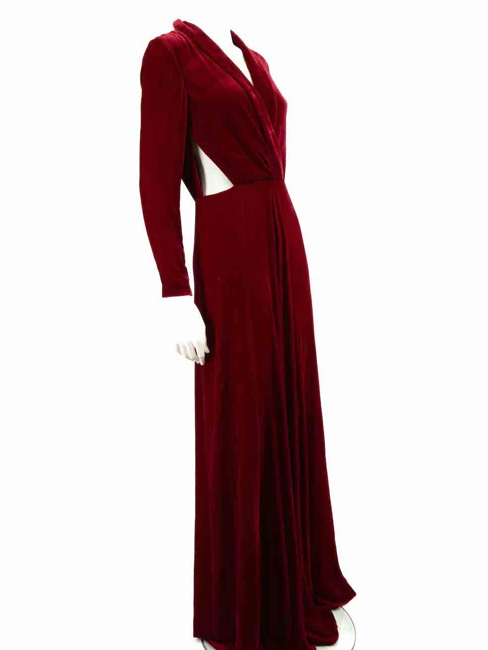 CONDITION is Never worn, with tags. No visible wear to jumpsuit is evident on this new Honayda designer resale item.
 
 
 
 Details
 
 
 Red
 
 Velvet
 
 Jumpsuit
 
 Long sleeves
 
 Zipped sleeve cuffs
 
 Plunge neck
 
 Side cut out detail
 
 Very