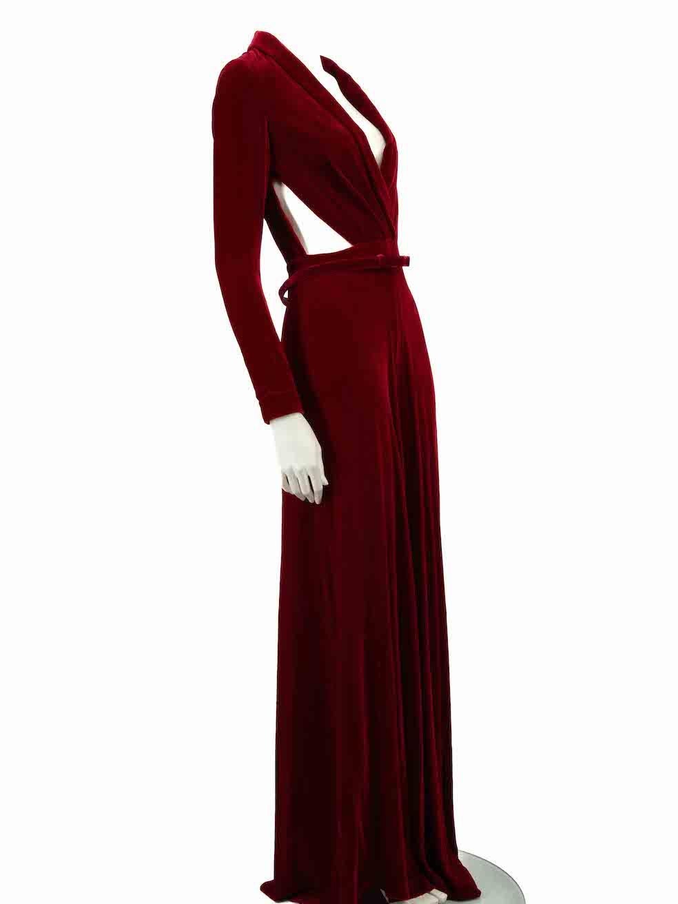 CONDITION is Very good. Minimal wear to jumpsuit is evident. Minimal wear to left underarm lining with discolouration on this used Honayda designer resale item.
 
 
 
 Details
 
 
 Red
 
 Velvet
 
 Jumpsuit
 
 Long sleeves
 
 Zip cuffed sleeves
 
