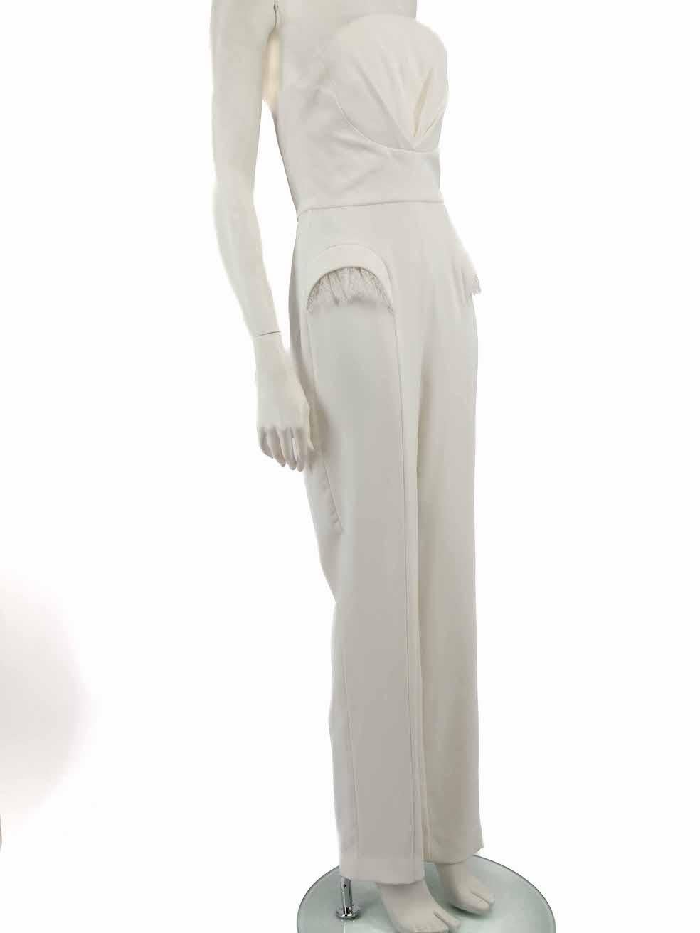 CONDITION is Very good. Minimal wear to jumpsuit is evident. Minimal wear to leg cuffs with discolouration and pilling. Discolouration may need gentle hand washing contrary to dry clean instructions on this used Honayda designer resale item.
 
 
 
