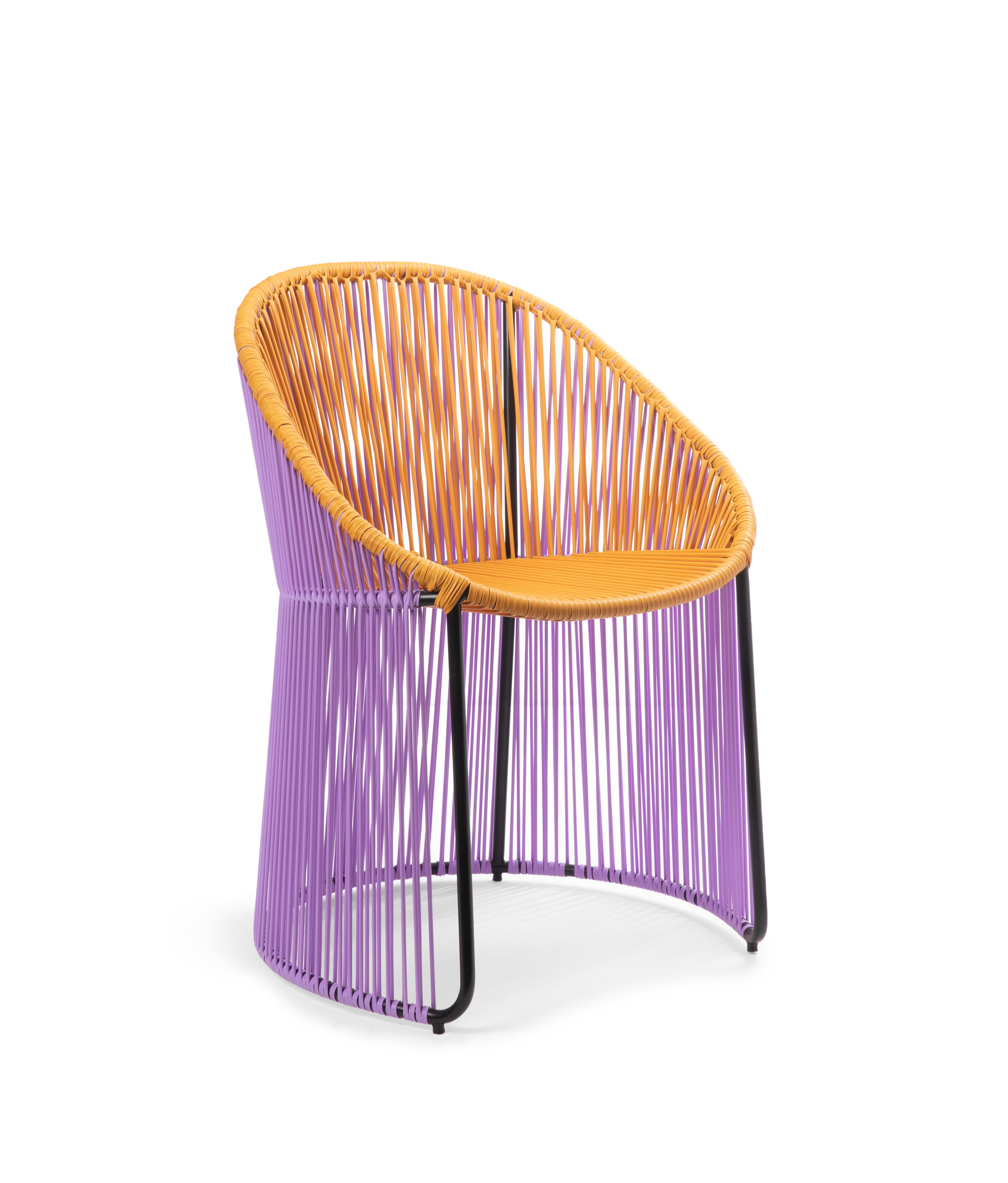 Honey/Lila Cartagenas dining chair by Sebastian Herkner
Materials: PVC strings. Galvanized and powder-coated tubular steel frame
Technique: made from recycled plastic. Weaved by local craftspeople in Colombia. 
Dimensions: W 60.2 x D 53.8 x H 84