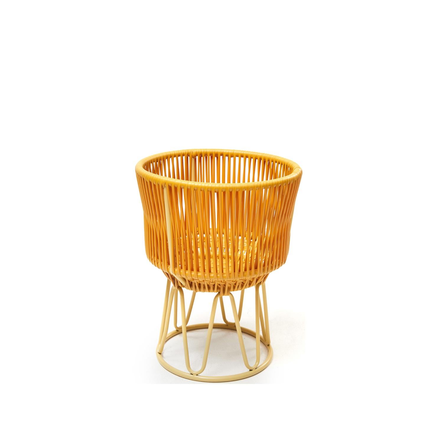 Honey circo flower pot 1 by Sebastian Herkner
Materials: Galvanized and powder-coated tubular steel. PVC strings.
Technique: Made from recycled plastic. Weaved by local craftspeople in Colombia. 
Dimensions: 
Top diameter 36 x Height 48 cm