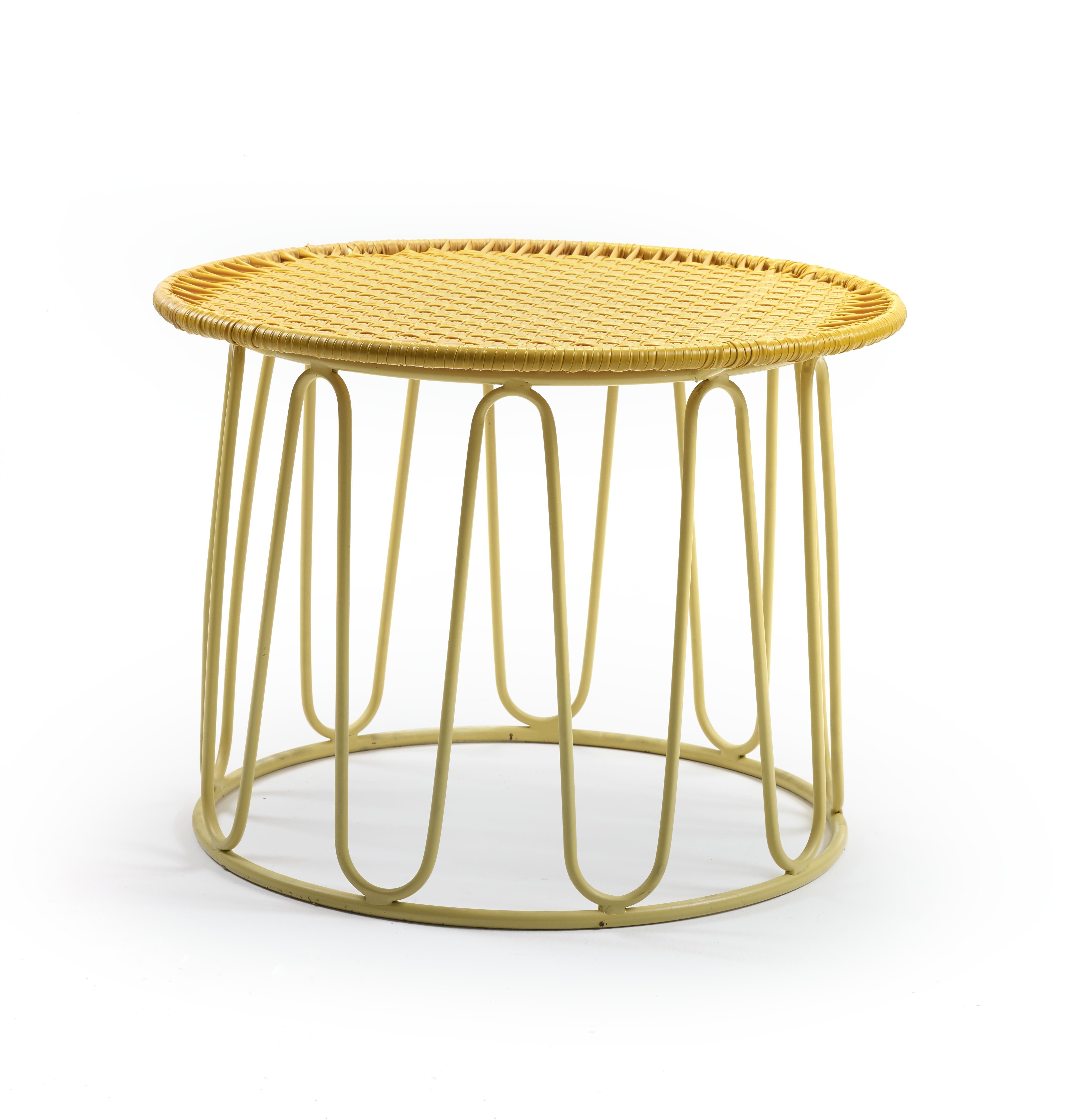 Honey Circo side table by Sebastian Herkner
Materials: galvanized and powder-coated tubular steel. PVC strings.
Technique: Made from recycled plastic. Weaved by local craftspeople in Colombia. 
Dimensions: 
Top diameter 55 cm 
Base diameter 51