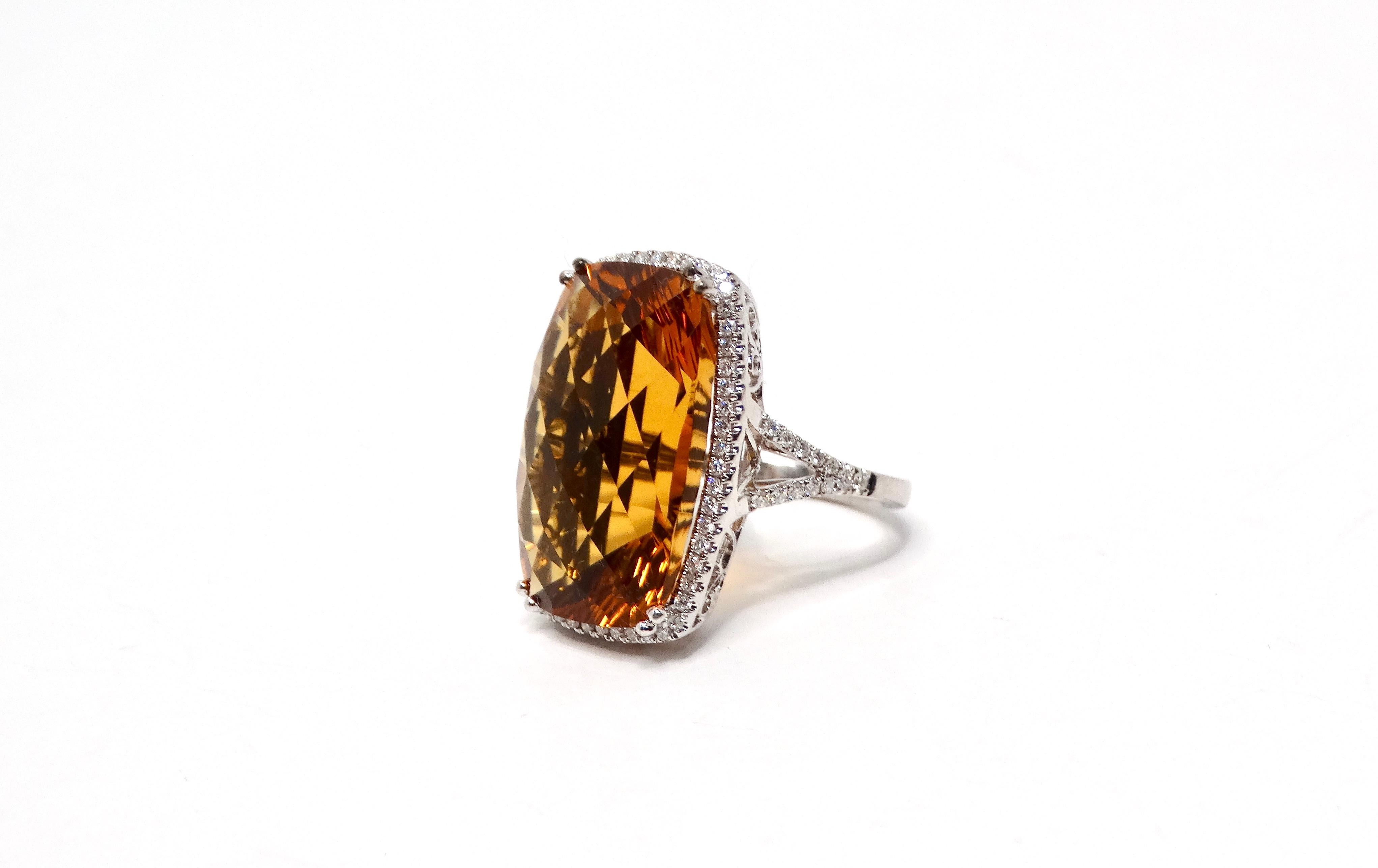 Introducing the stunning Honey Citrine White Gold Cocktail Ring, a true statement piece for any jewelry collection. This exquisite ring features a large, warm honey citrine stone at its center, approximately 16 carats, radiating a golden glow that