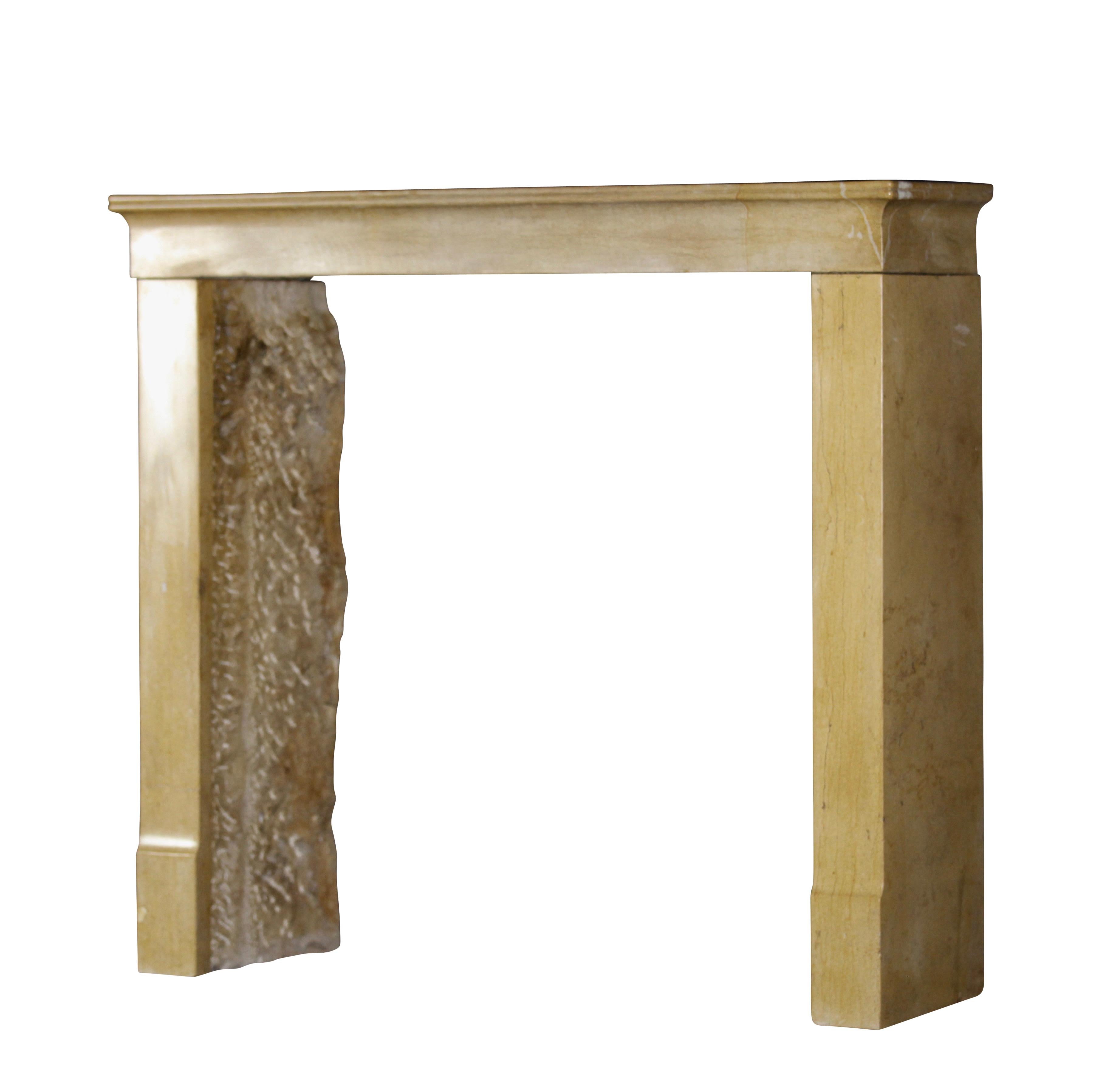 A 19th century French elegant mantle. This is a petite original antique fireplace surround. A typical petite bourguignon in it typical honey color hard stone from that region. Dijon. Perfect to create a cosy timeless room.
Measures:
108 cm