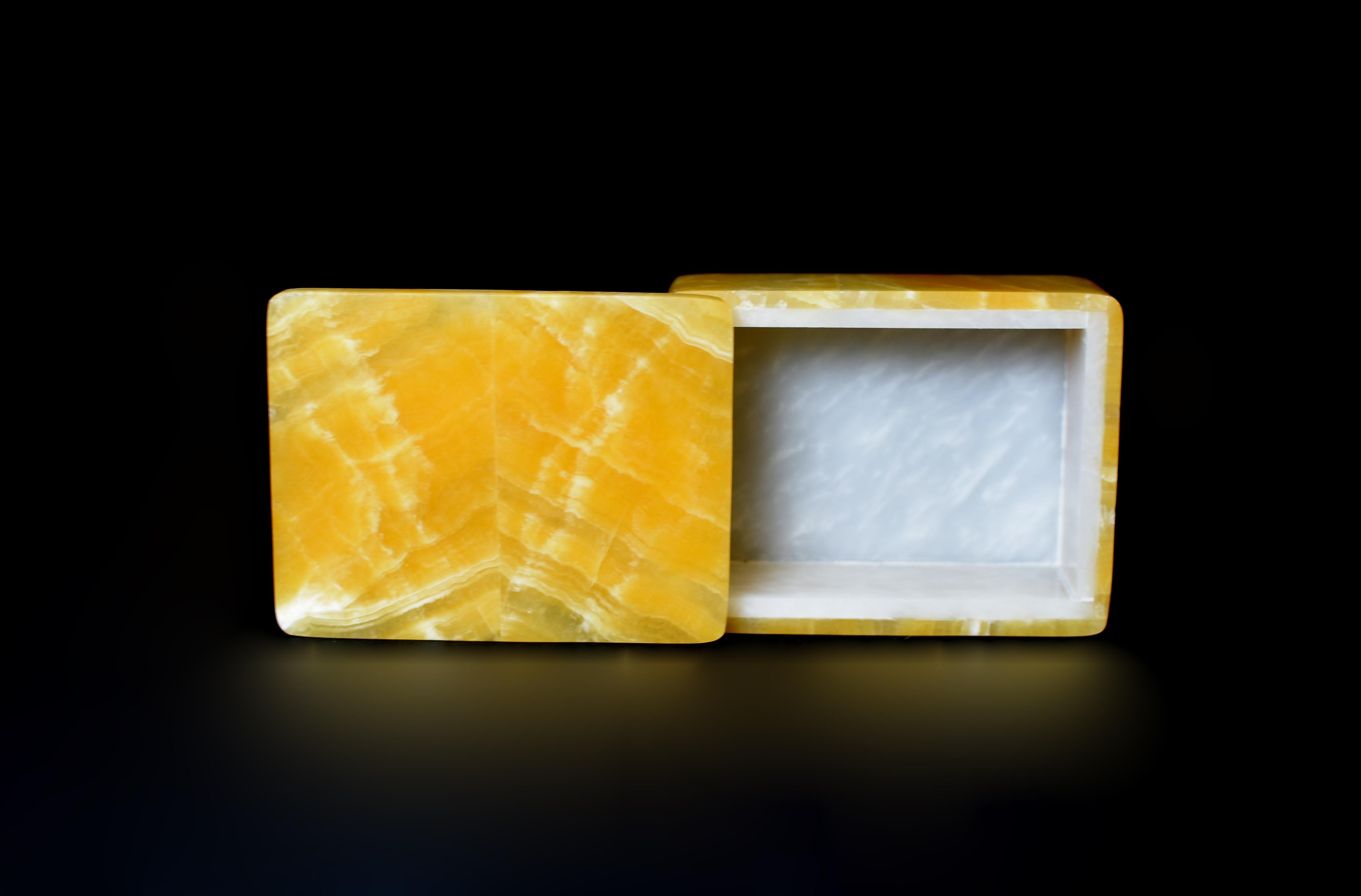 This exquisite 1.2-lb creation is crafted from the finest rare honey calcite onyx sourced from Pakistan. Hand made by a master artisan in Italy, showcasing beautiful patterns and bands that are distinctively unique to calcite onyx.  Lustrous, warm