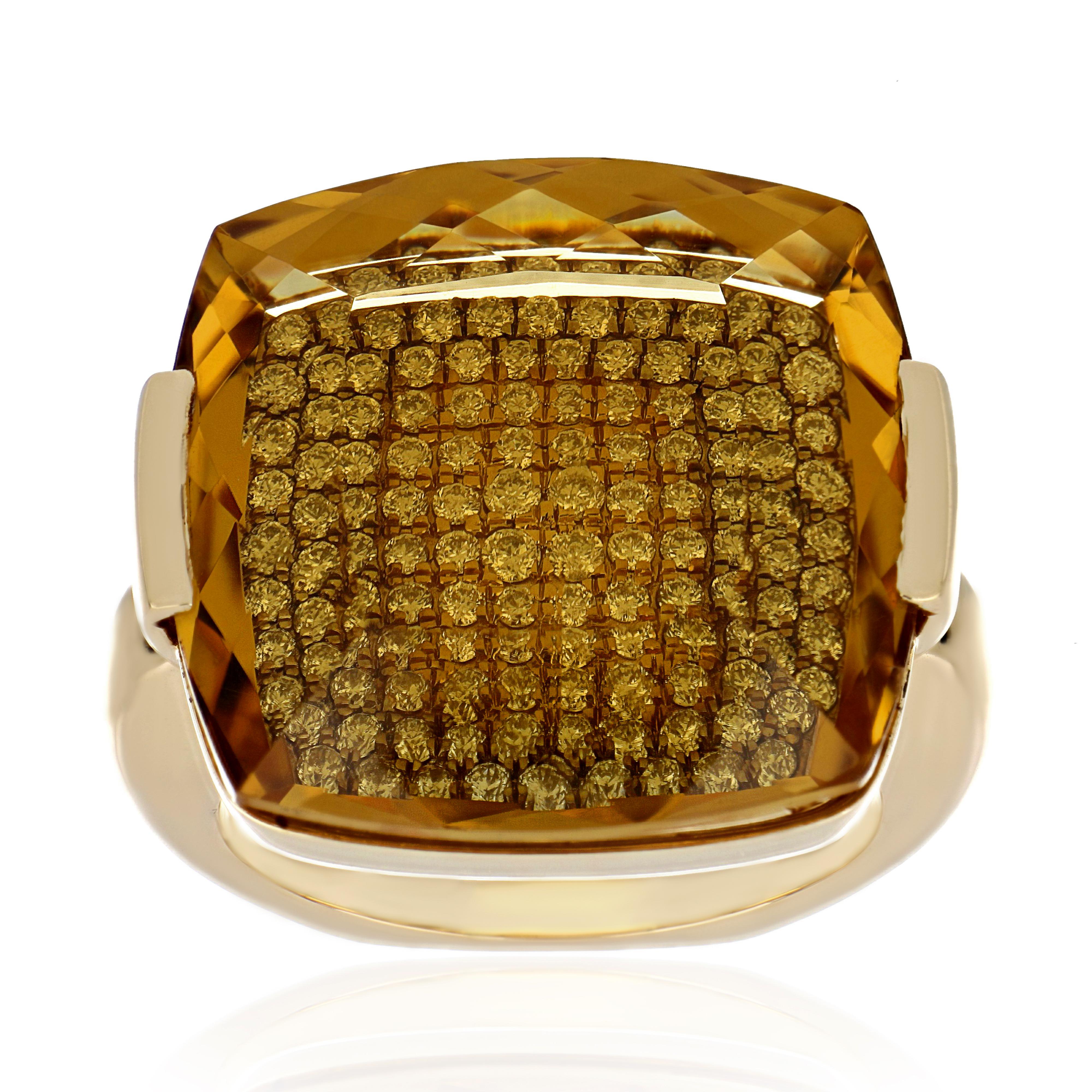14 Karat Yellow Gold ring studded with Cushion Cut  22.98 Ct  Honey Quartz,  with unique under stone setting of  0.74 Cts Diamond Beautifully hand crafted in 14 Karat Yellow Gold.

Stone Details:
Honey Quartz: 20 x 20 mm

Stone Weights:
Honey