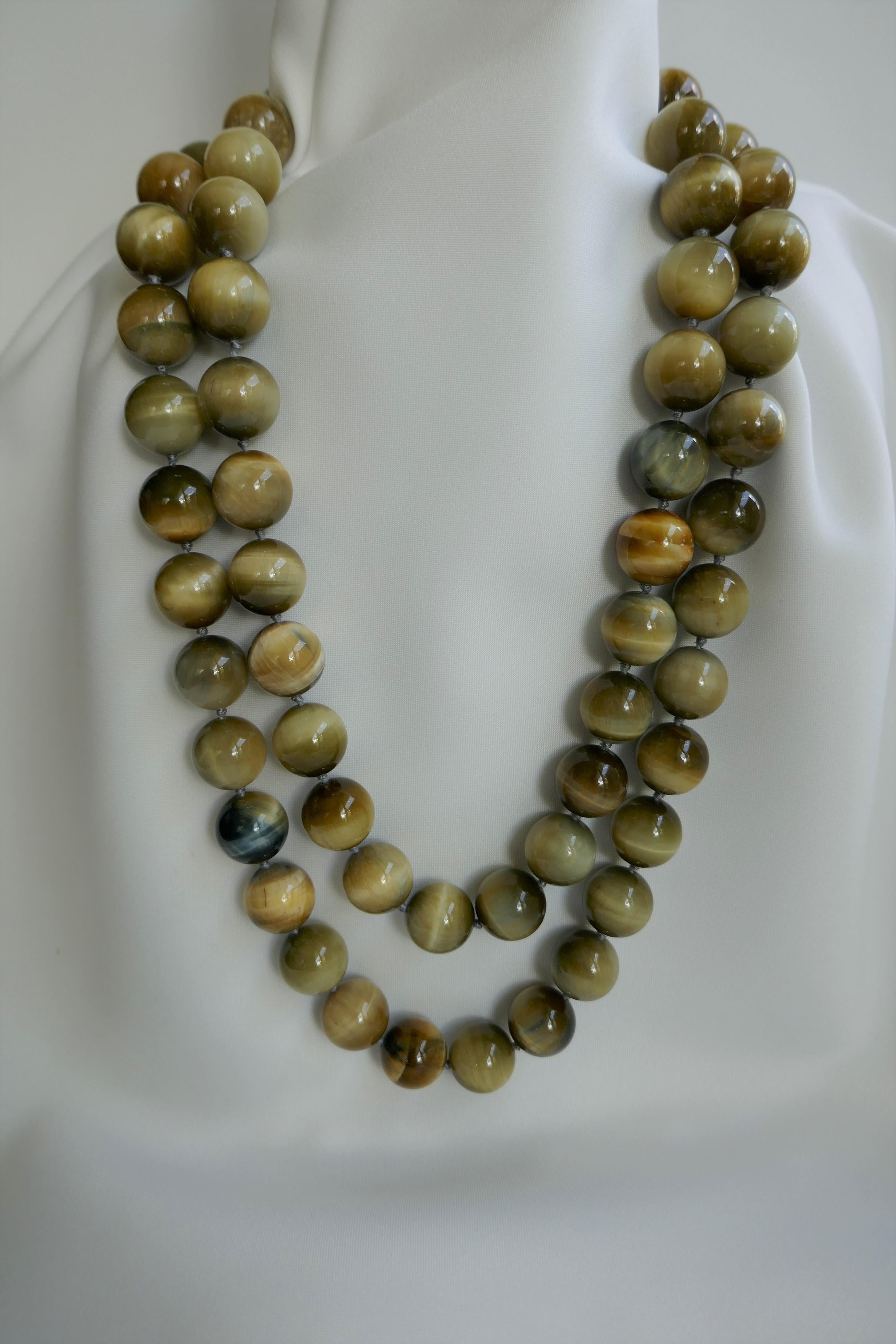 Honey tiger eye a very wearable stone. I feel in love with these beads when I saw them. This 16mm honey tiger eye necklace is a statement necklace that looks beautiful on. It can be worn long or doubled. Given the color of the honey tiger eye bead