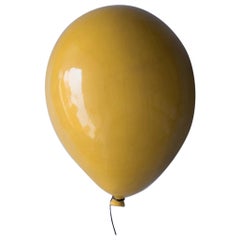 Mustard yellow glossy ceramic balloon sculpture handmade for wall, Small