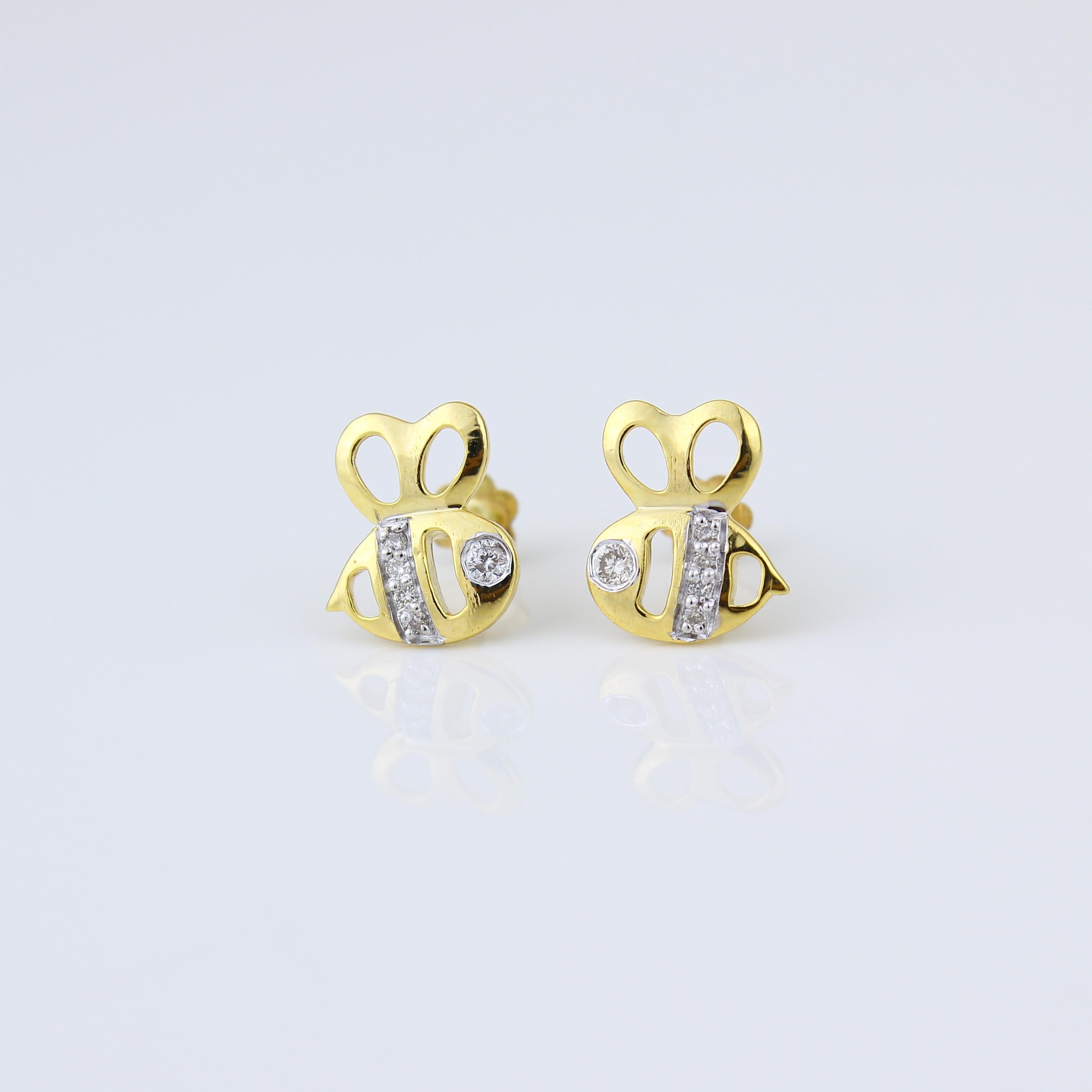 The Honeybee Diamond Kid Earrings are a delightful and charming accessory for young fashion enthusiasts. Expertly crafted from 18K solid gold, these earrings feature adorable honeybee designs accented with glimmering diamonds. With their playful yet