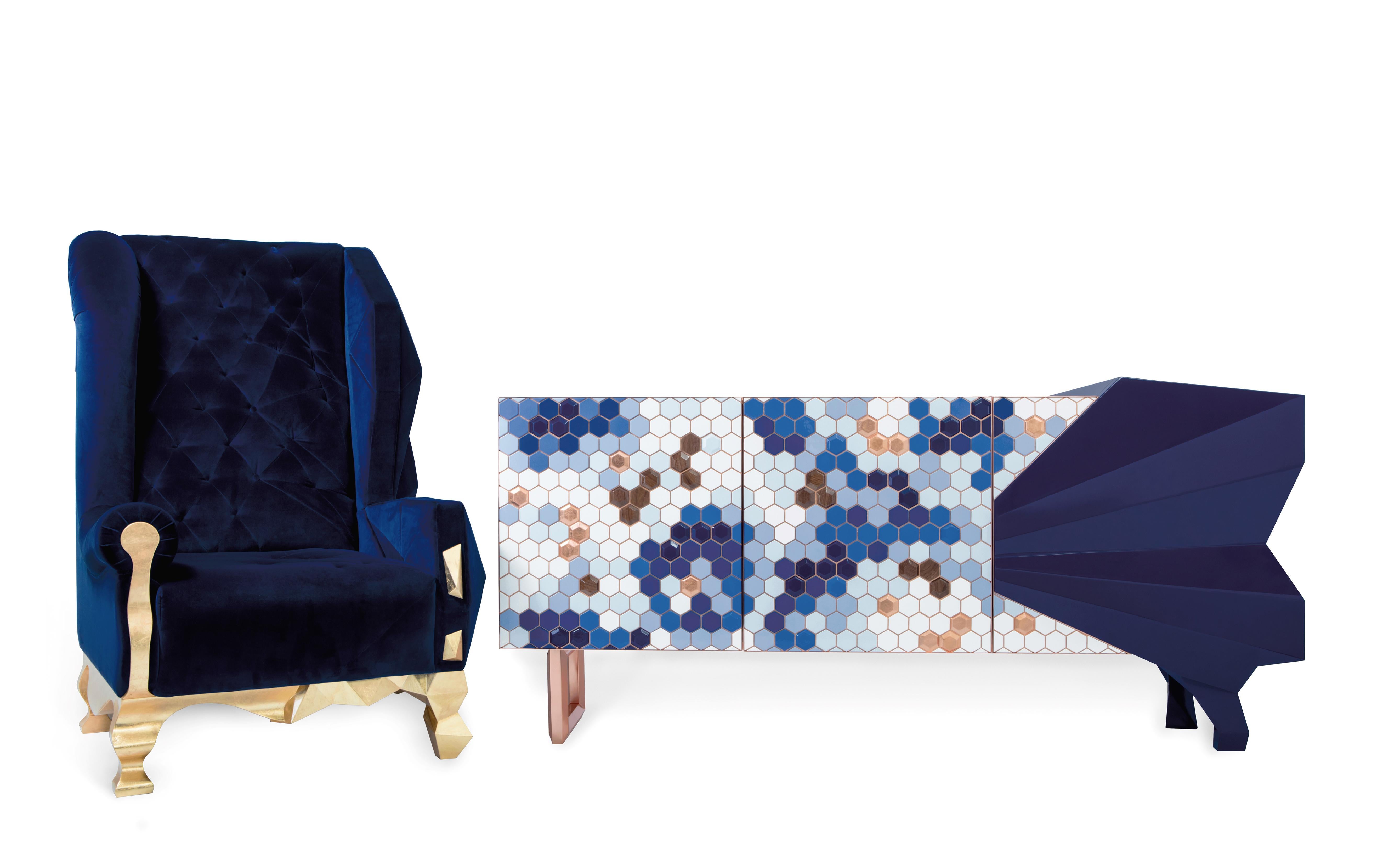 Honeycomb blue sideboard - Royal Stranger
Dimensions: 95 x 201 x 60 cm
Materials: Black Pearl color combination with gold leaf and stainless steel coated in brass.

Inspired by one of the most intrinsic forms of nature, this sideboard transforms