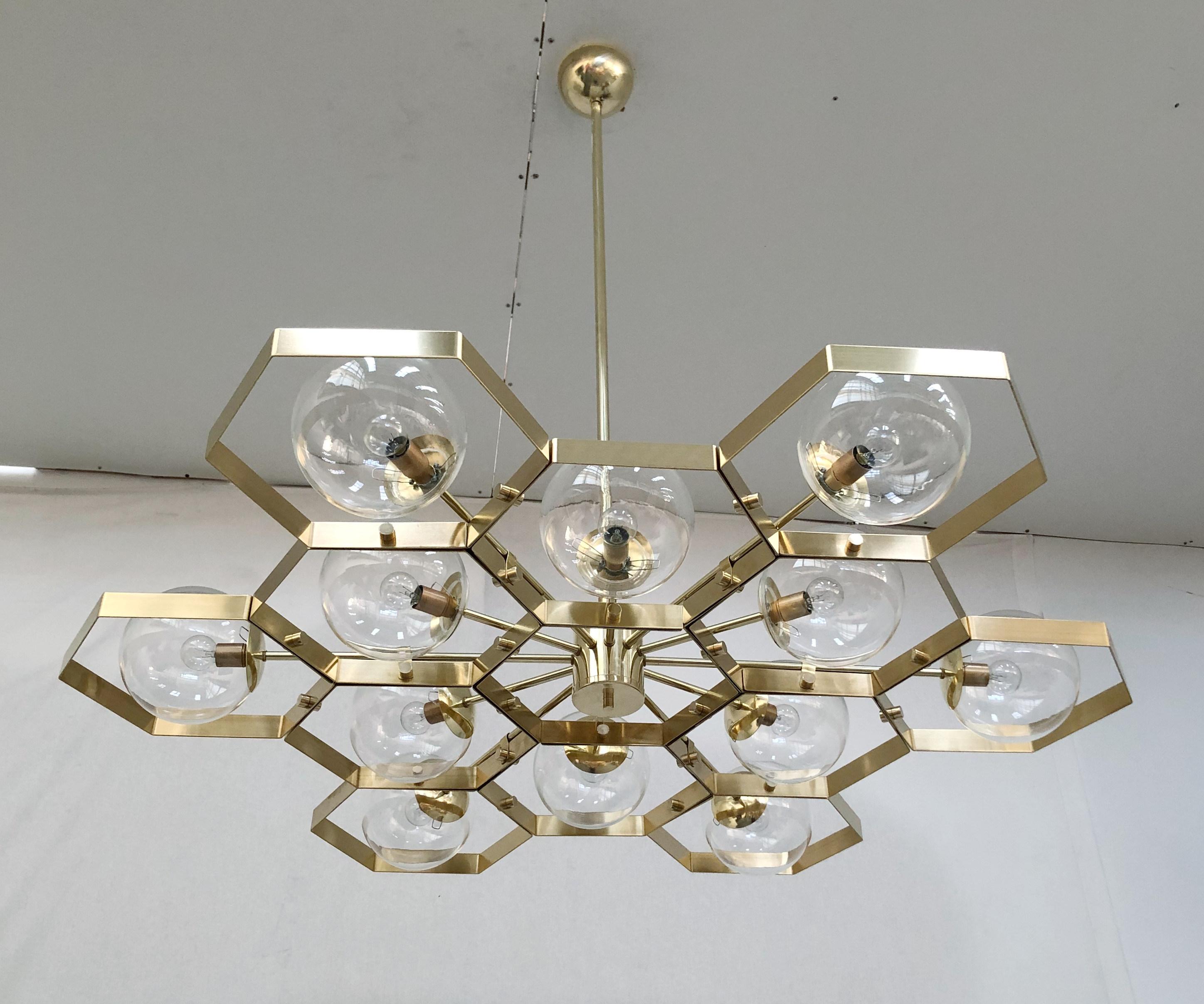 Italian modern chandelier with Murano glass globes, mounted on unlacquered brass frame / designed by Fabio Bergomi for Fabio Ltd, made in Italy
Measures: Diameter 47 inches, height 45 inches with rod and canopy
12 lights / E12 or E14 type / max 40W