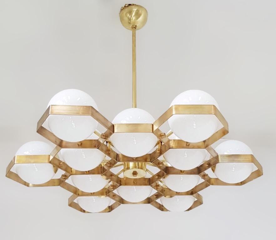 Italian modern chandelier with Murano glass globes, mounted on unlacquered brass frame / Made in Italy
Designed by Fabio Ltd, inspired by Angelo Lelli and Arredoluce styles
12 lights / E12 or E14 type / max 40W each
Diameter: 36 inches / Height: 30