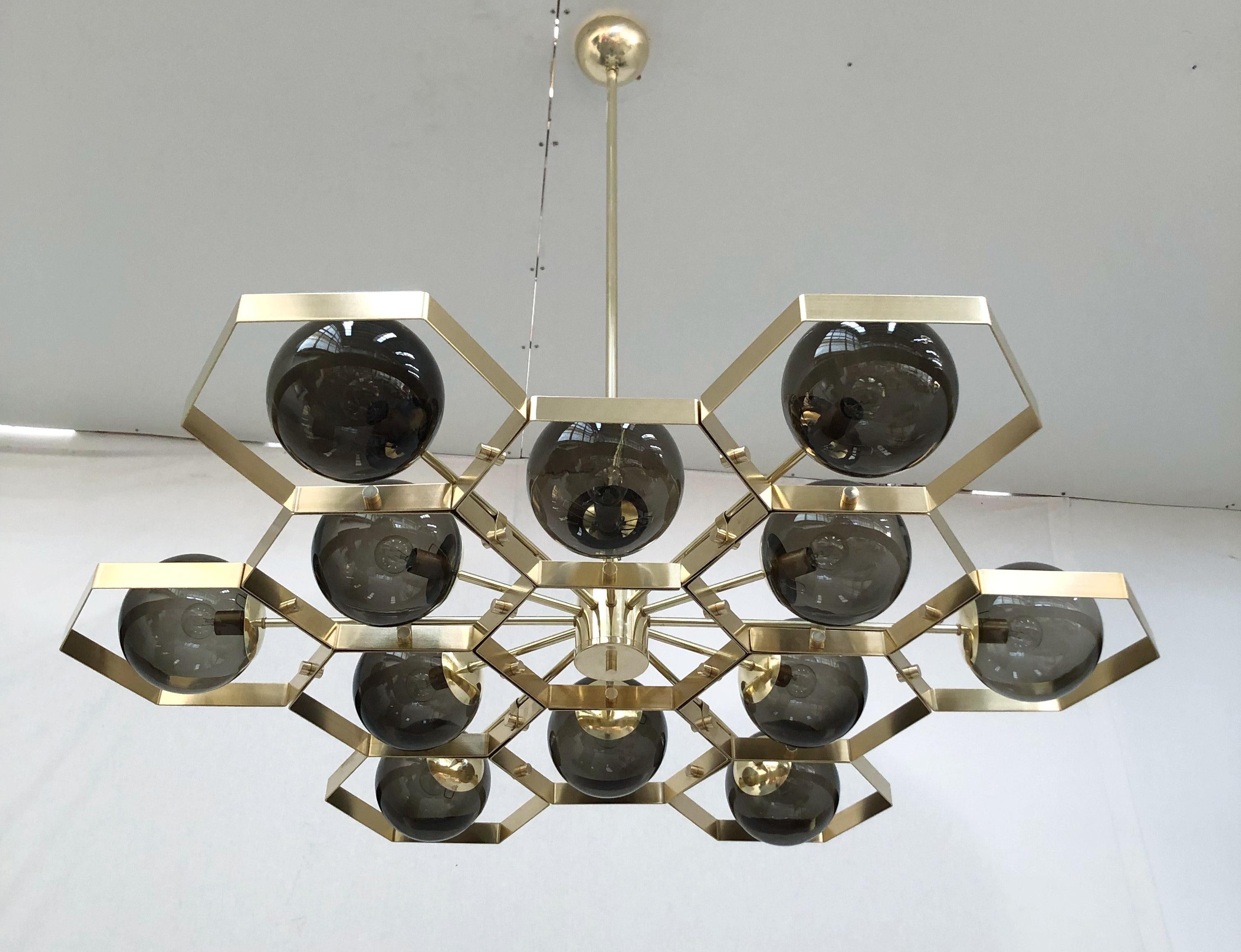 Italian modern chandelier with Murano glass globes, mounted on unlacquered brass frame / designed by Fabio Bergomi for Fabio Ltd, made in Italy
Measures: Diameter 47 inches, height 45 inches with rod and canopy
12 lights / E12 or E14 type / max 40W